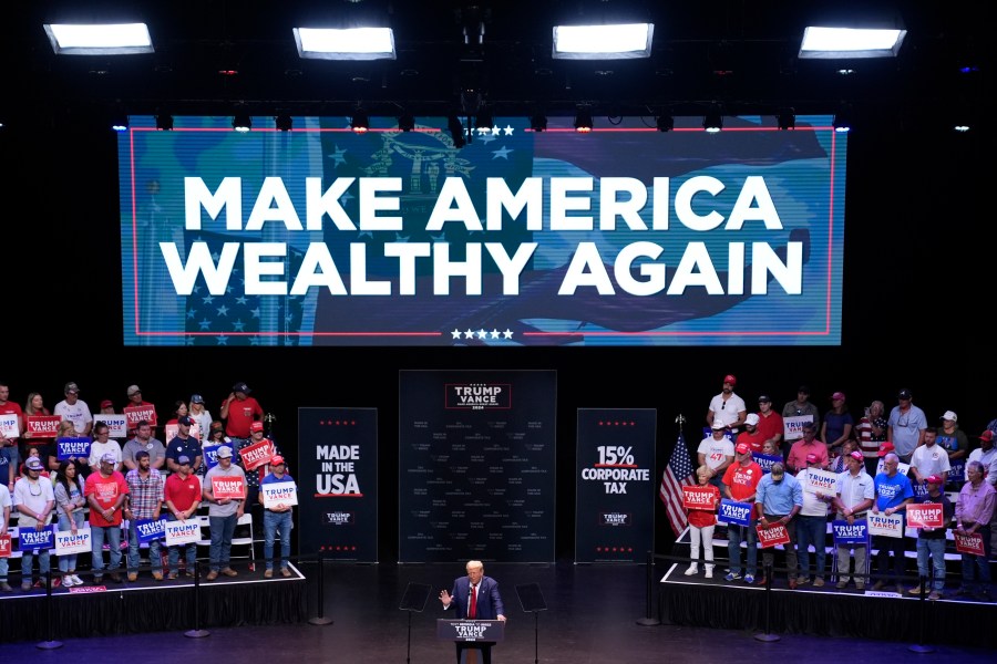 Republican presidential nominee former President Donald Trump speaks about the tax code and manufacturing at the Johnny Mercer Theatre Civic Center, Tuesday, Sept. 24, 2024, in Savannah, Ga. (AP Photo/Evan Vucci)