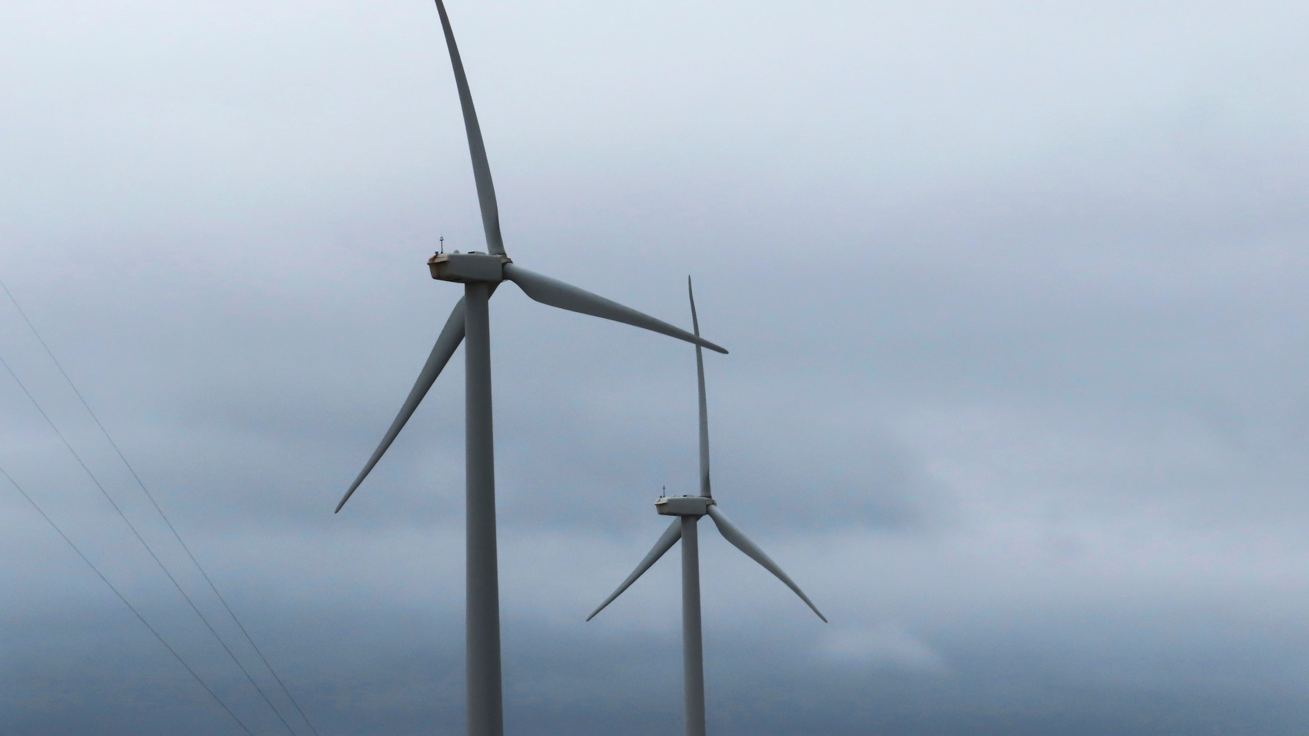 Land-based wind turbines spin in Atlantic City, N.J. on Sept. 18, 2024. (AP Photo/Wayne Parry)