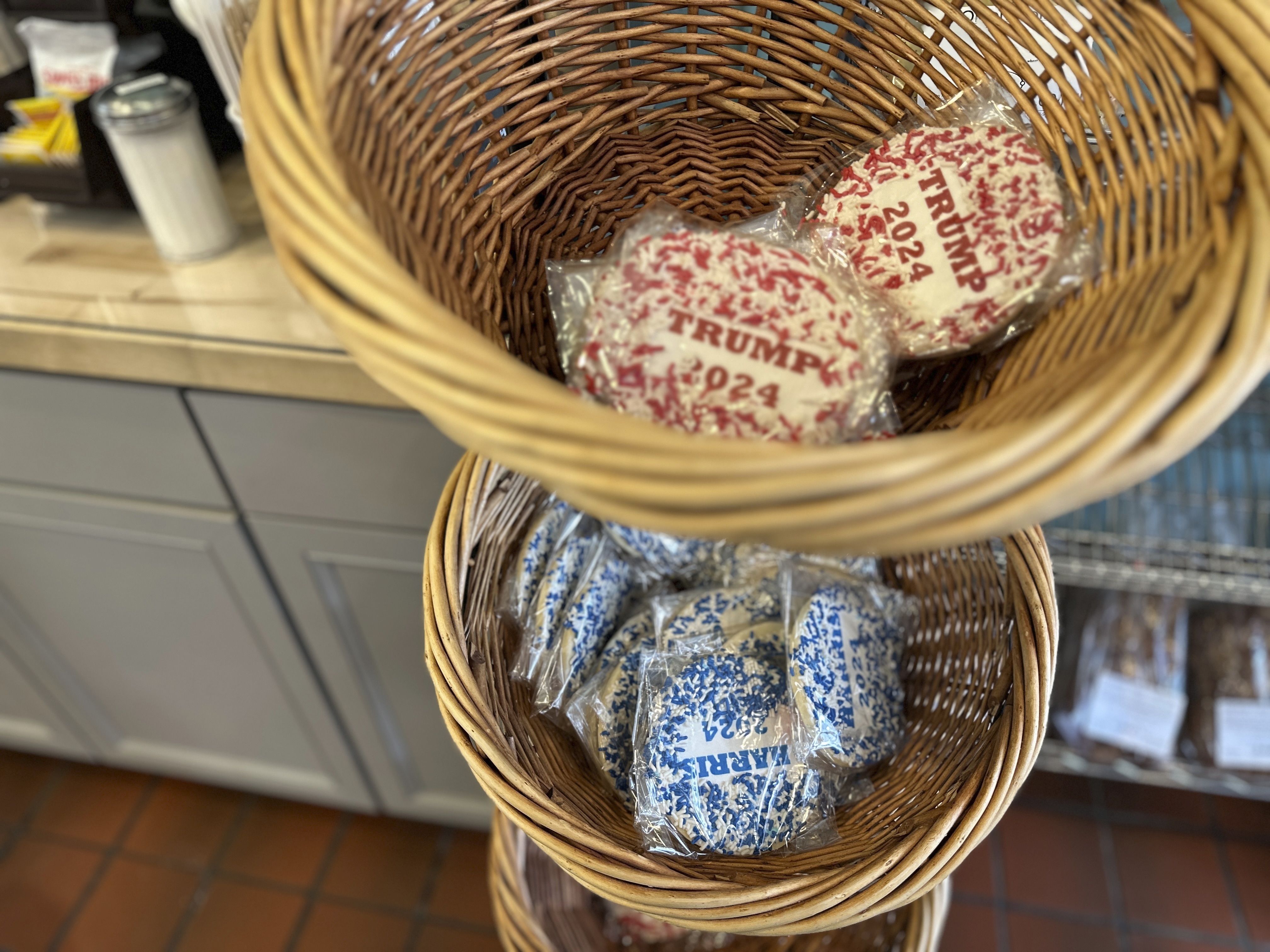 Cookies, with Harris and Trump labels on, are on display at Lochel's Bakery in the town of Hatboro in suburban Philadelphia, Tuesday, Sept. 24, 2024. Lochel's Bakery started the election cookie poll in 2008 as a joke between the third-generation bakery owners and their local customers. (AP Photo/Tassanee Vejpongsa)