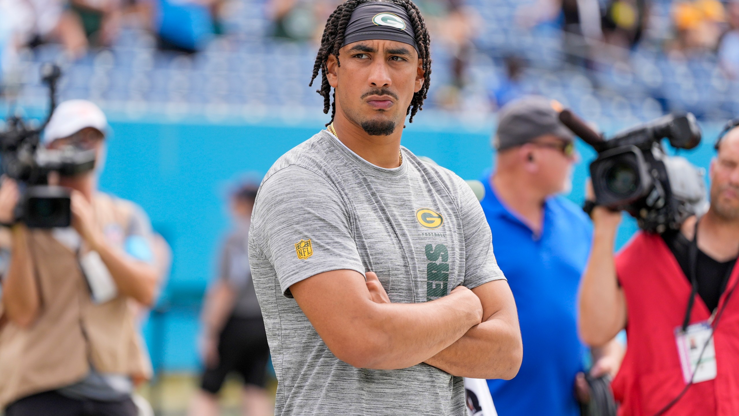 Green Bay Packers' Jordan Love watches before an NFL football game against the Tennessee Titans Sunday, Sept. 22, 2024, in Nashville, Tenn. (AP Photo/George Walker IV)