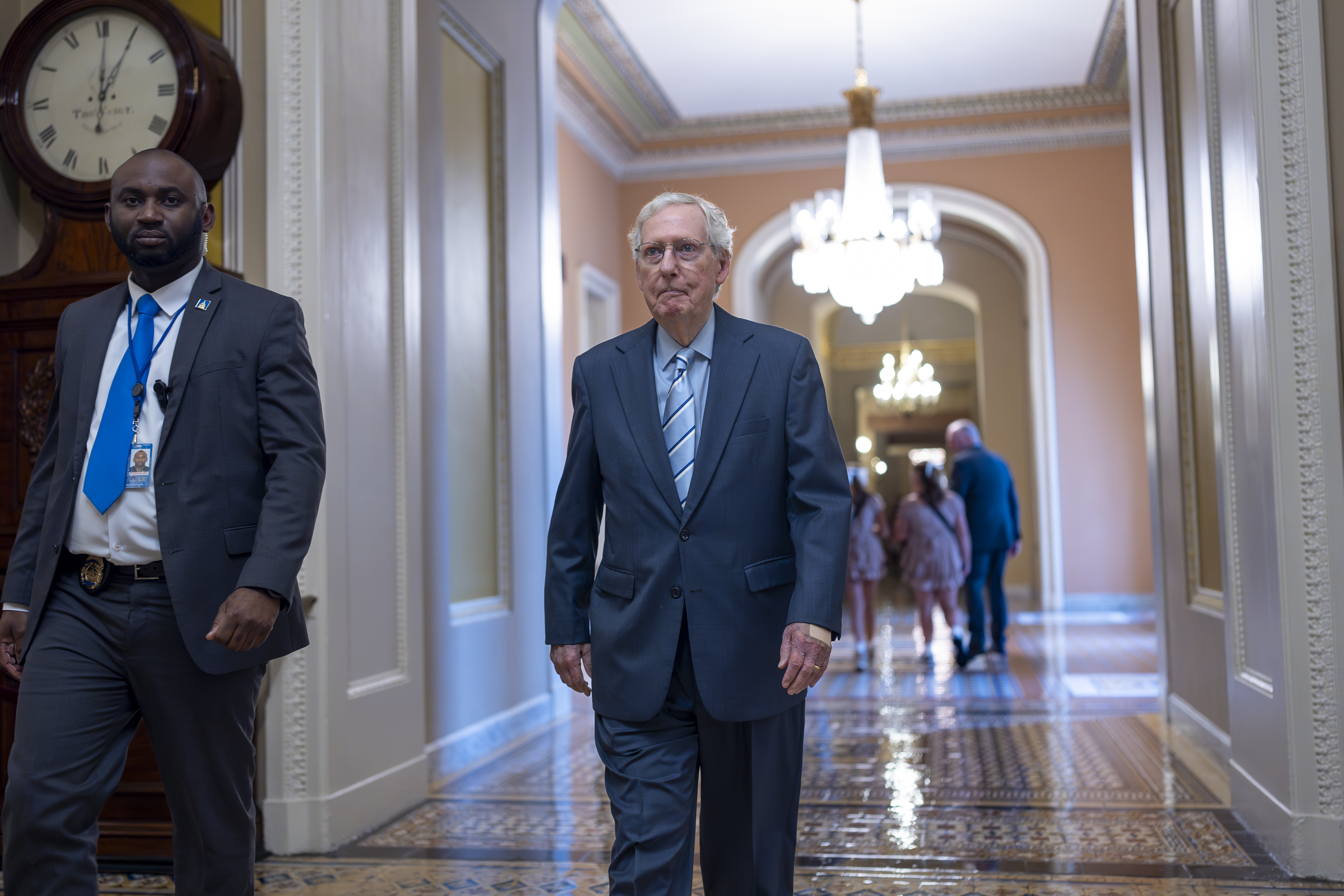 Senate Minority Leader Mitch McConnell, R-Ky., heads to the chamber as Congress prepares for votes on an interim spending bill to avoid a government shutdown next week, at the Capitol in Washington, Wednesday, Sept. 25, 2024. (AP Photo/J. Scott Applewhite)