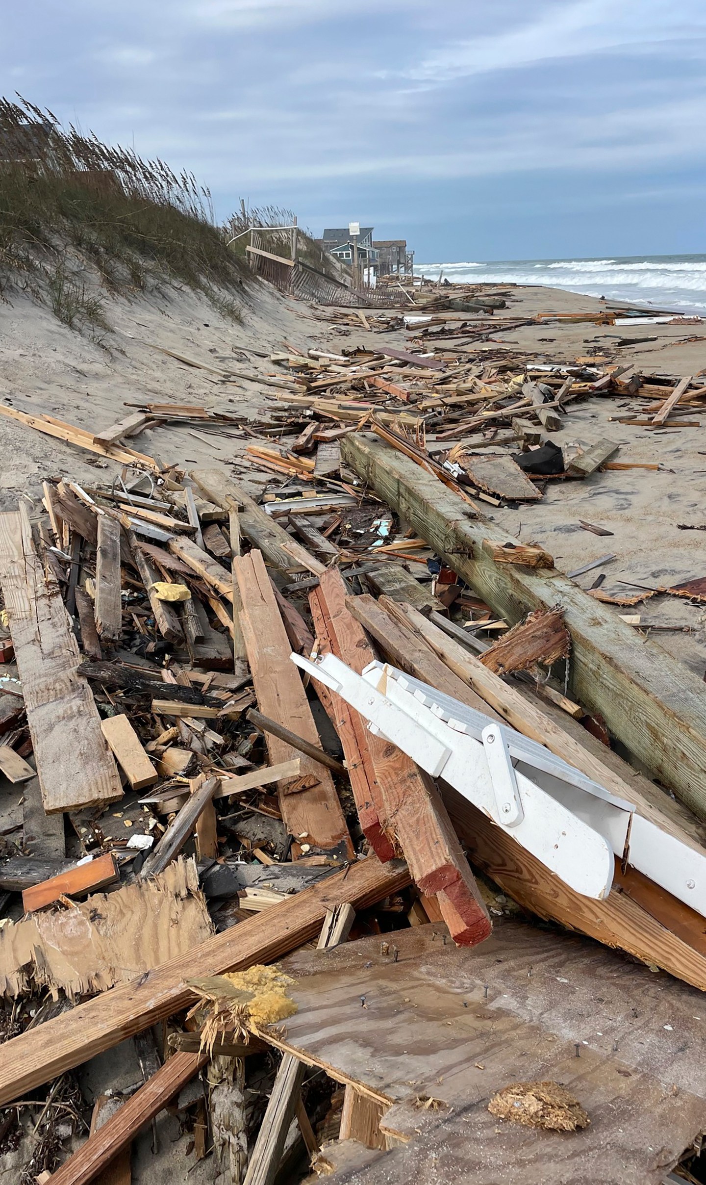 CORRECTS DATE This photo provided by Cape Hatteras National Seashore shows debris from a collapsed house in Rodanthe, N.C., on Tuesday, Sept. 24, 2024. (Cape Hatteras National Seashore/National Park Service via AP)