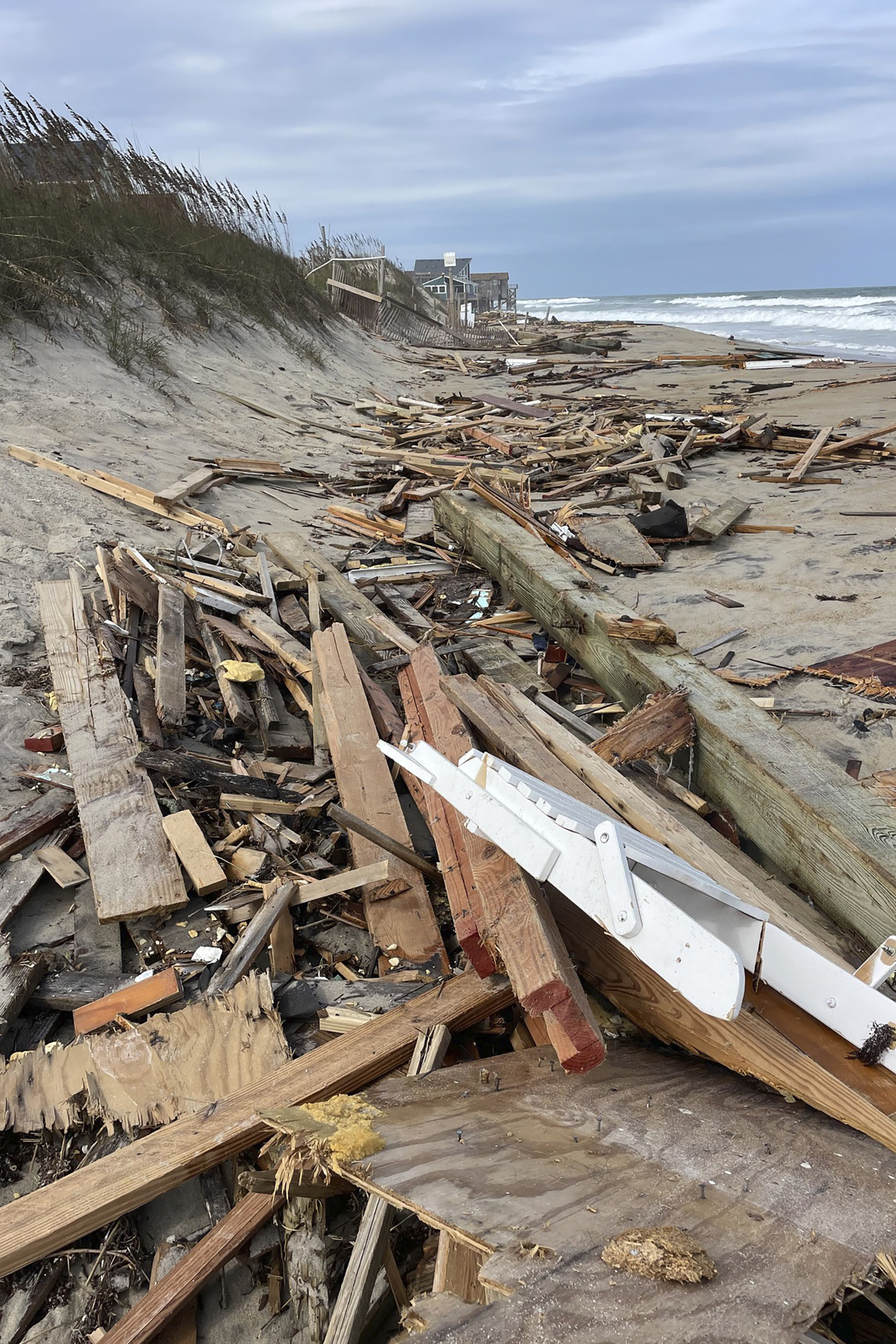 CORRECTS DATE This photo provided by Cape Hatteras National Seashore shows debris from a collapsed house in Rodanthe, N.C., on Tuesday, Sept. 24, 2024. (Cape Hatteras National Seashore/National Park Service via AP)