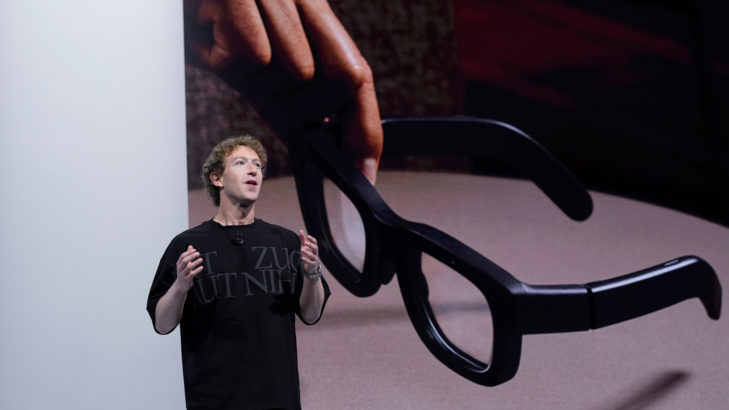 Mark Zuckerberg talks about the Orion AR glasses during the Meta Connect conference Wednesday, Sept. 25, 2024, in Menlo Park, Calif. (AP Photo/Godofredo A. Vásquez)