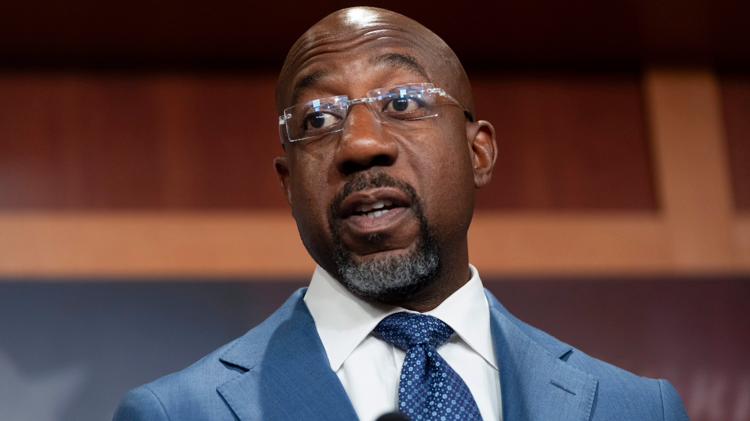 FILE - Sen. Raphael Warnock, D-Ga., speaks at a news conference at the Capitol in Washington on Sept. 12, 2024. (AP Photo/Ben Curtis, File)