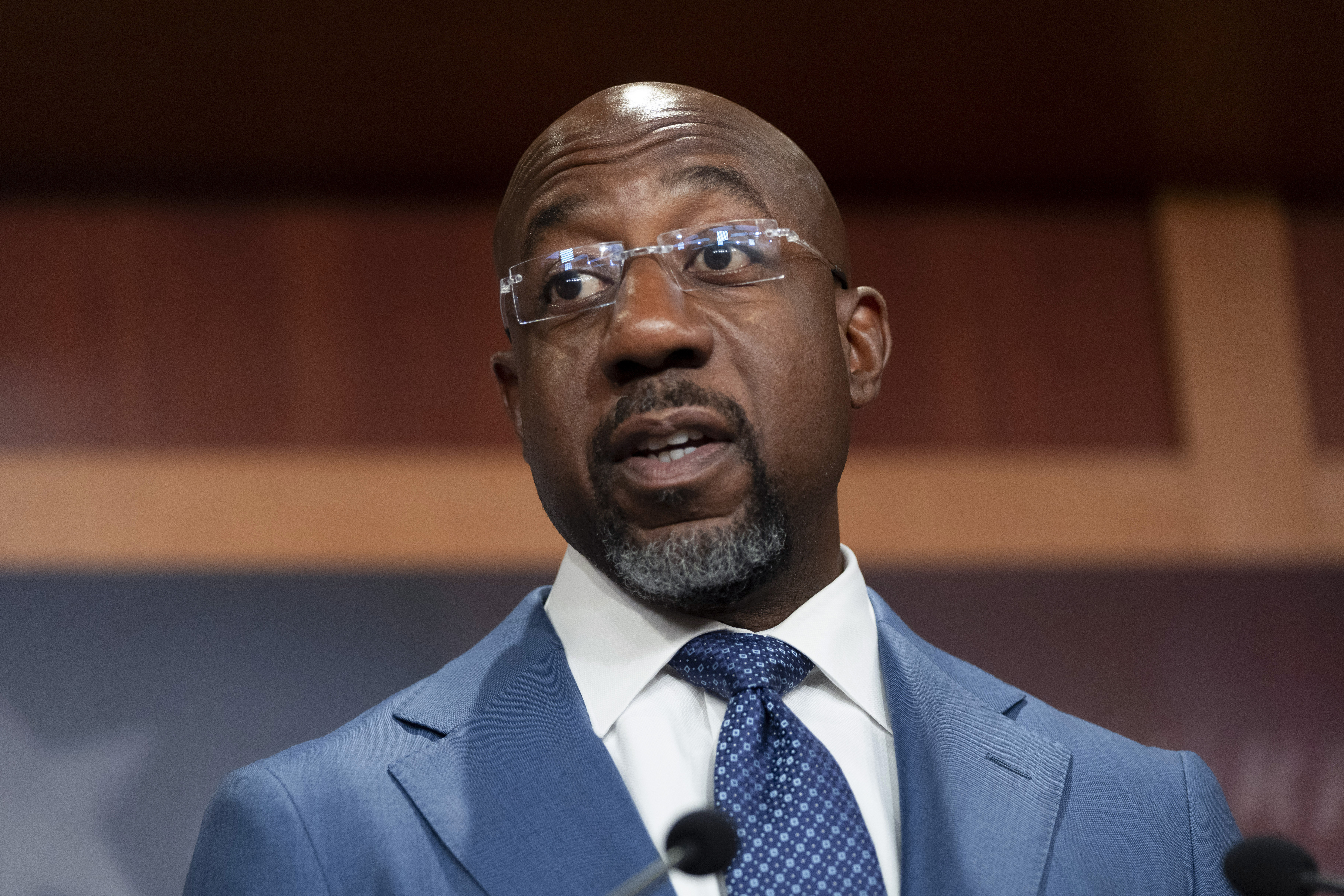 FILE - Sen. Raphael Warnock, D-Ga., speaks at a news conference at the Capitol in Washington on Sept. 12, 2024. (AP Photo/Ben Curtis, File)