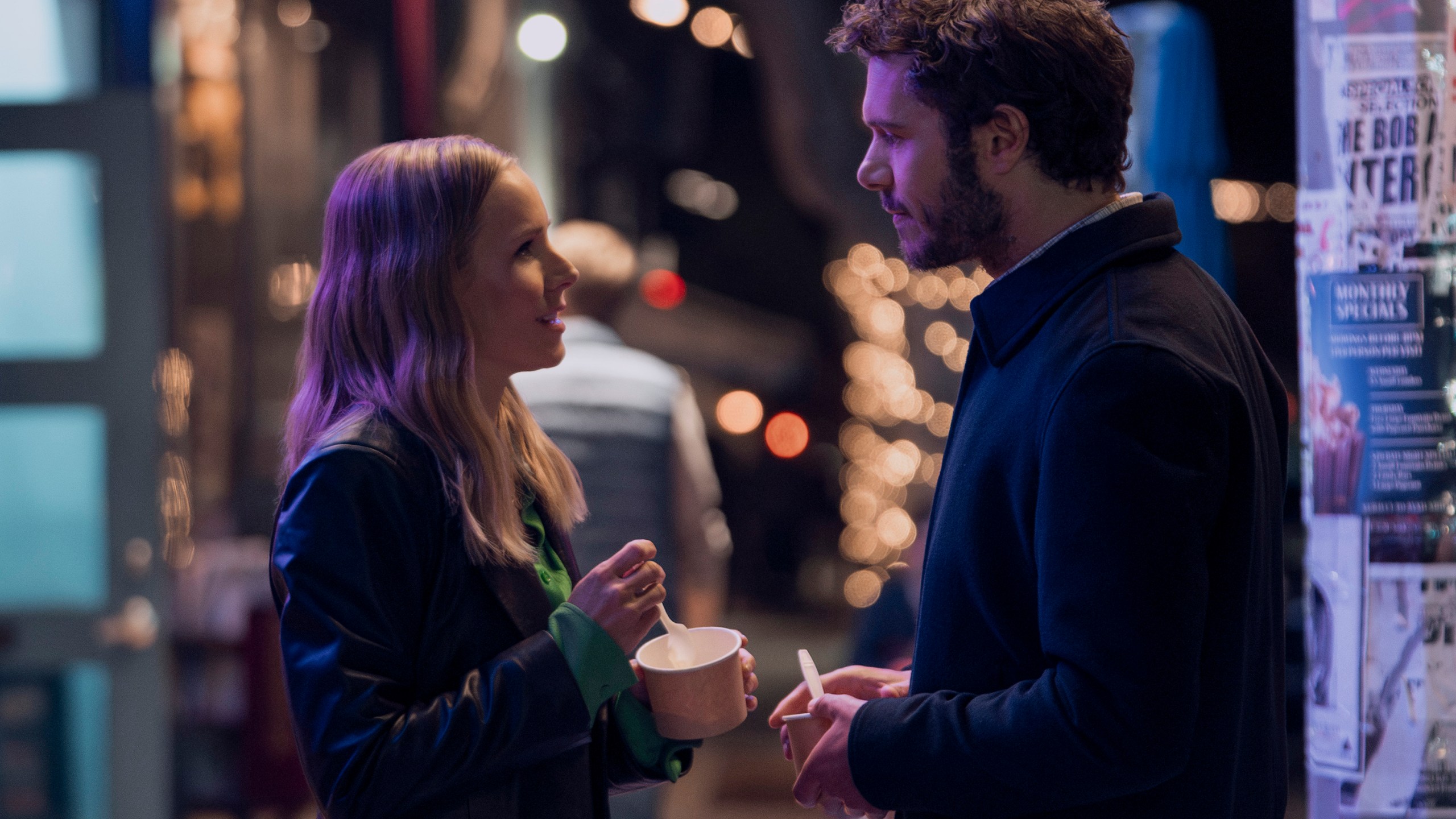 This image released by Netflix shows Kristen Bell, left, and Adam Brody in a scene from "Nobody Wants This." (Stefania Rosini/Netflix via AP)