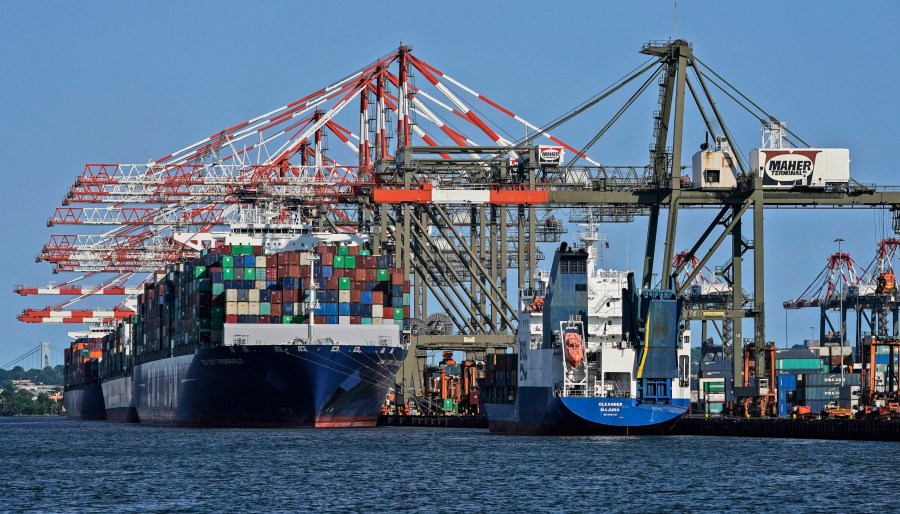 FILE - Container ships are docked at the Port of New York and New Jersey in Elizabeth, N.J., on May 20, 2021. (AP Photo/Seth Wenig, File)