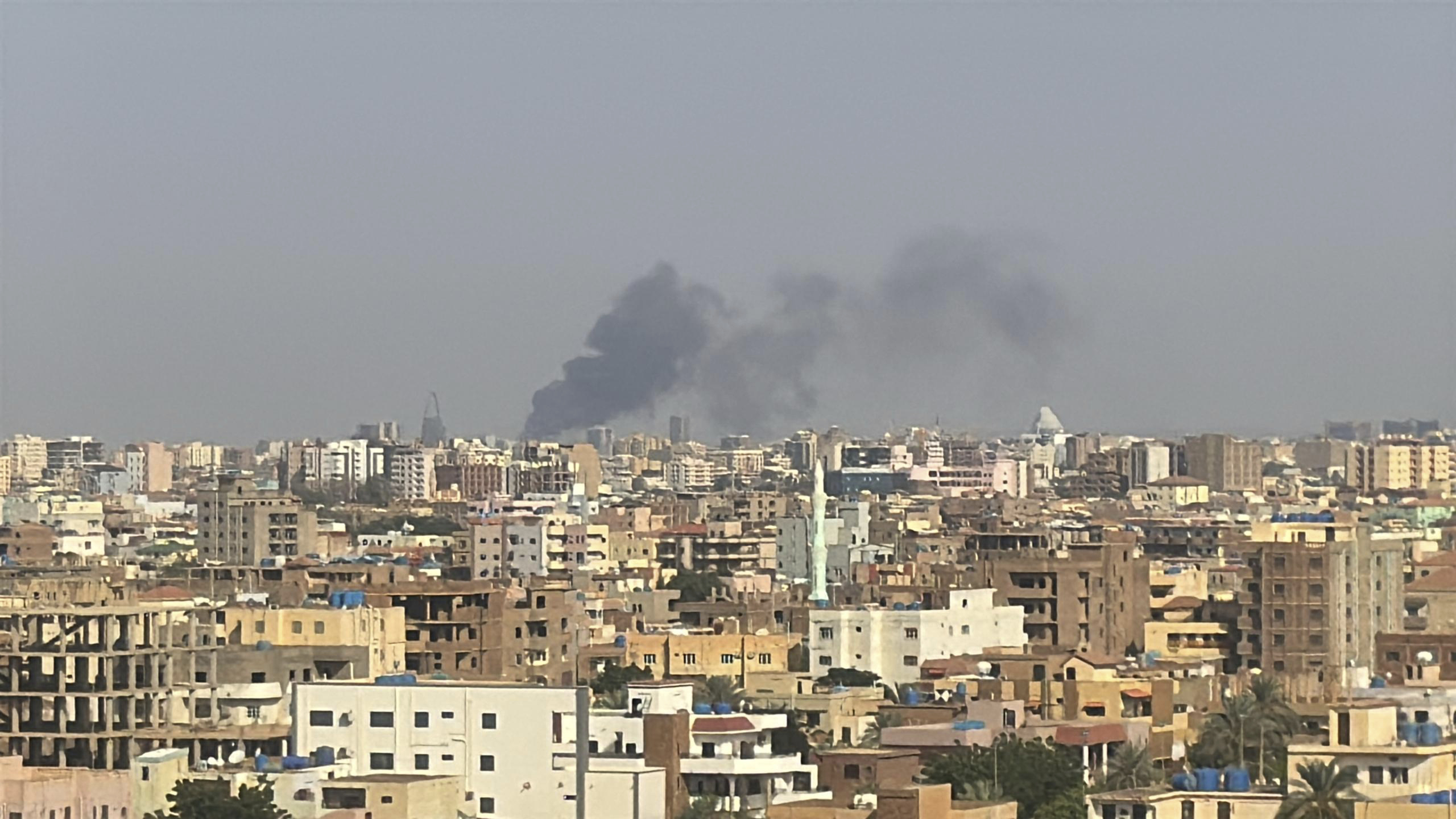 This grab from video shows smoke rising over Khartoum, Sudan on Thursday Sept. 26, 2024, after Sudan’s military started an operation to take areas of the capital from its rival, the paramilitary Rapid Support Forces. (AP Photo/Rashed Ahmed)