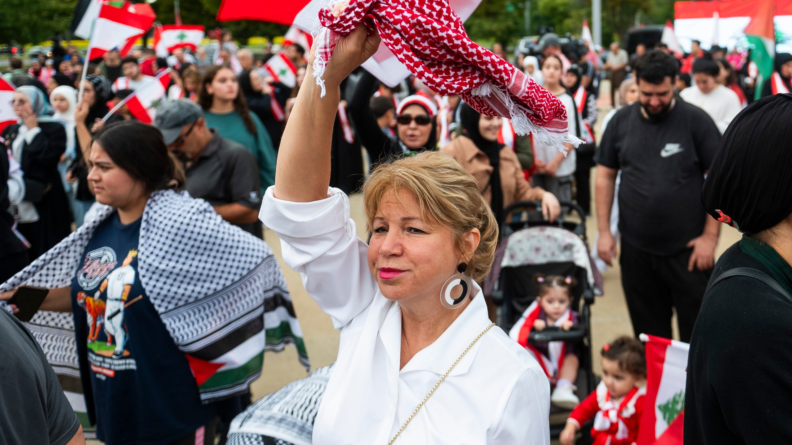 Andrea Awada-Zeaiter of Dearborn attends a rally in support of Lebanon in light of recent Israeli strikes that killed hundreds, on Wednesday, Sept. 25, 2024 in front of the Henry Ford Centennial Library in Dearborn, Mich. (Katy Kildee/Detroit News via AP)