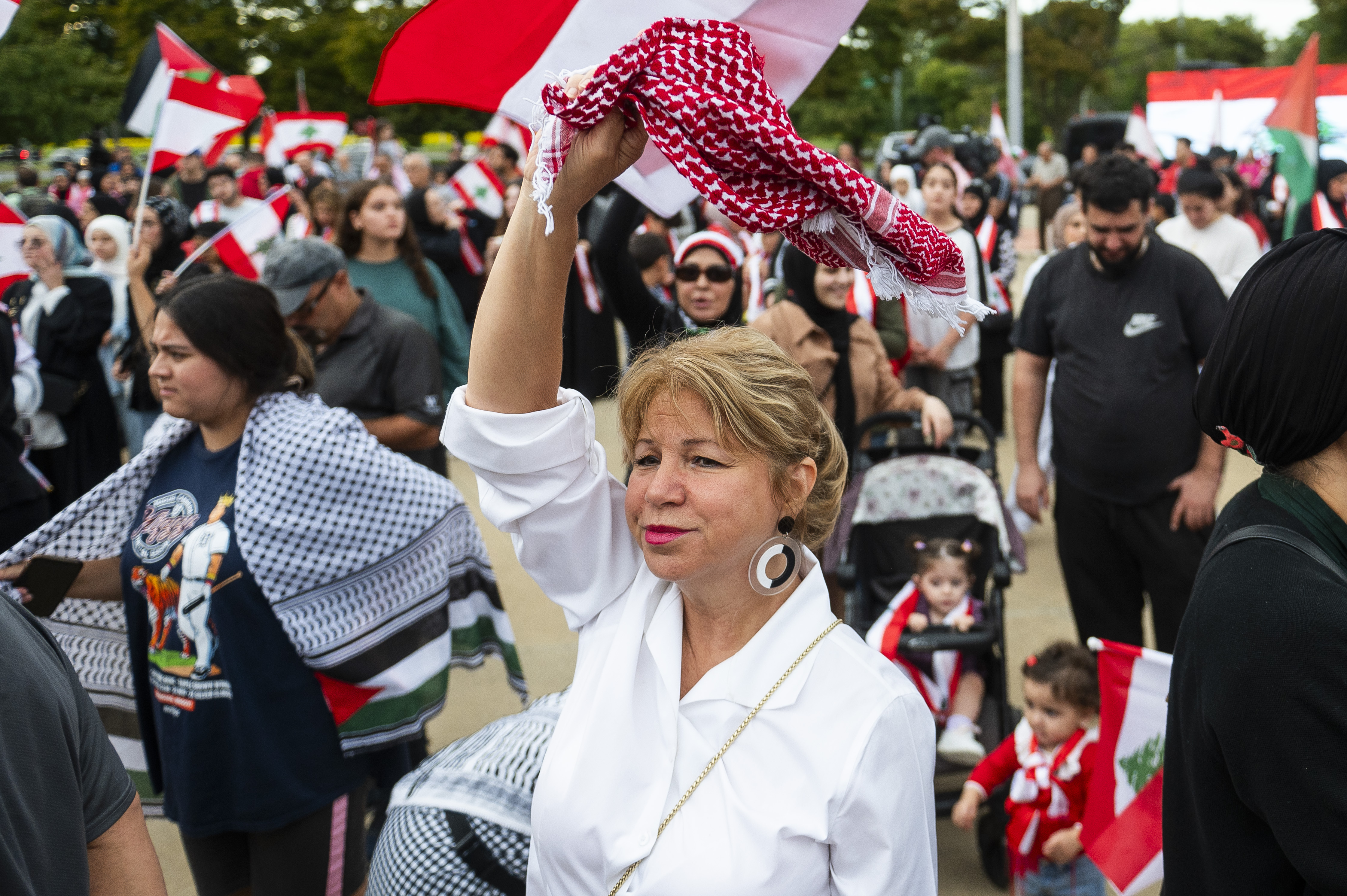 Andrea Awada-Zeaiter of Dearborn attends a rally in support of Lebanon in light of recent Israeli strikes that killed hundreds, on Wednesday, Sept. 25, 2024 in front of the Henry Ford Centennial Library in Dearborn, Mich. (Katy Kildee/Detroit News via AP)