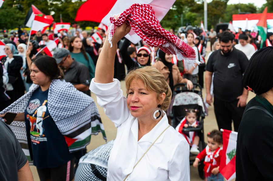 Andrea Awada-Zeaiter of Dearborn attends a rally in support of Lebanon in light of recent Israeli strikes that killed hundreds, on Wednesday, Sept. 25, 2024 in front of the Henry Ford Centennial Library in Dearborn, Mich. (Katy Kildee/Detroit News via AP)