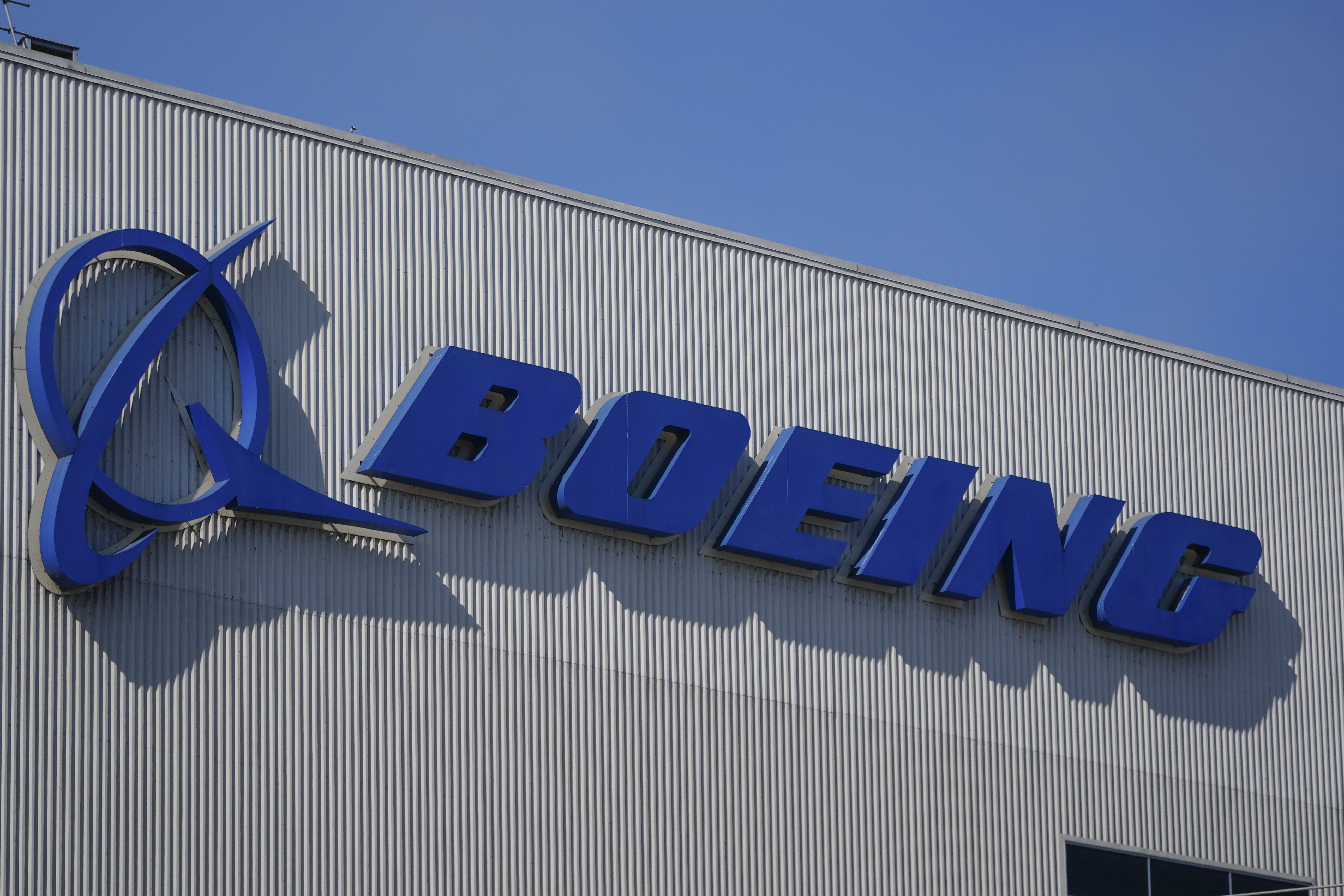 The Boeing logo is displayed at the company's factory Tuesday, Sept. 24, 2024, in Renton, Wash. (AP Photo/Lindsey Wasson)