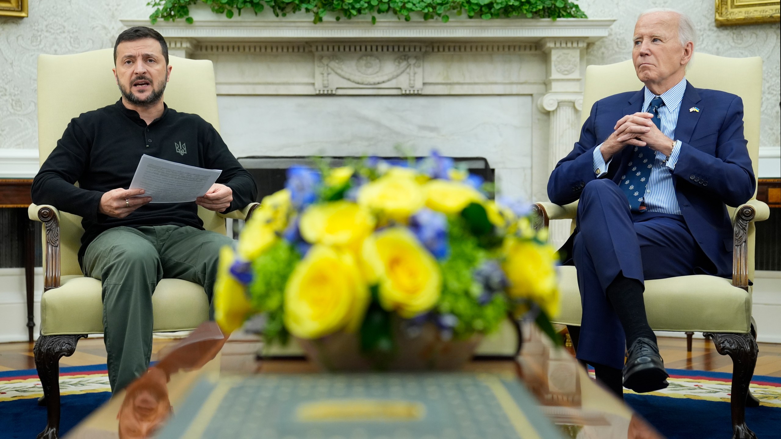 President Joe Biden, right, listens as Ukraine's President Volodymyr Zelenskyy, left, speaks during their meeting in the Oval Office of the White House in Washington, Thursday, Sept. 26, 2024. (AP Photo/Susan Walsh)