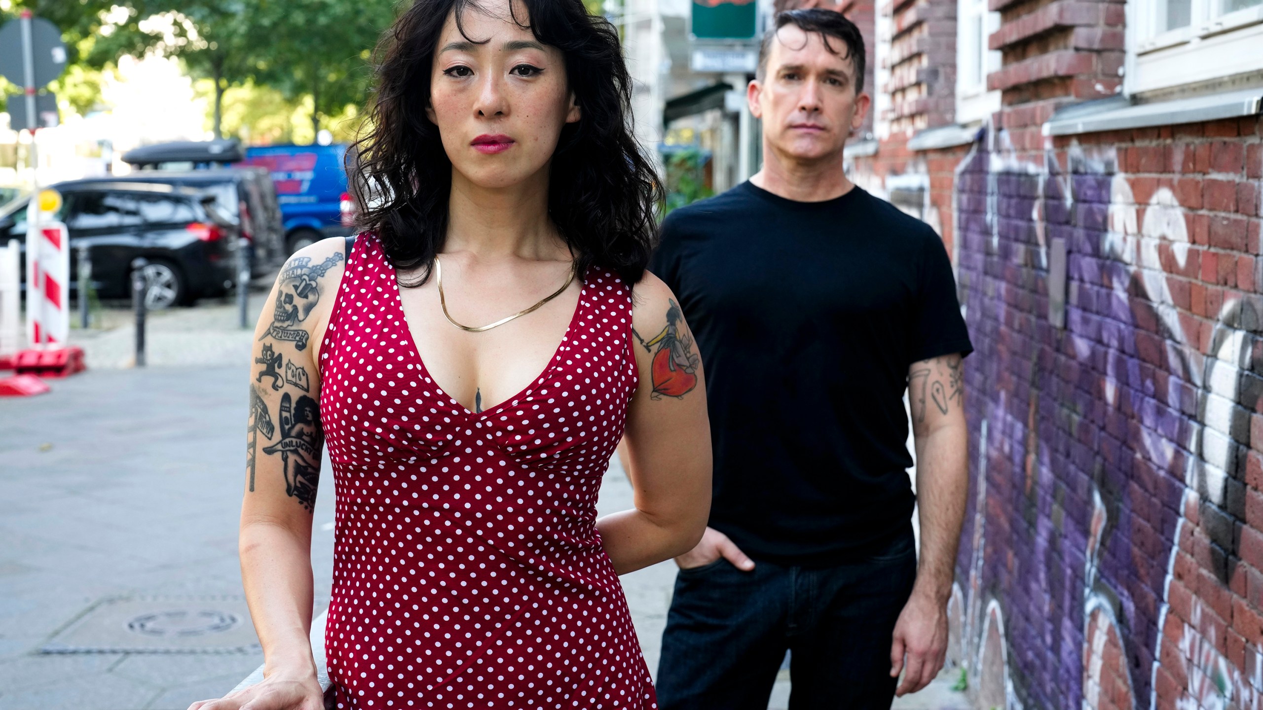 Angela Seo, left, and Jamie Stewart of the band Xiu Xiu pose for a portrait in Berlin, Germany, Wednesday, Aug. 28, 2024. (AP Photo/Markus Schreiber)