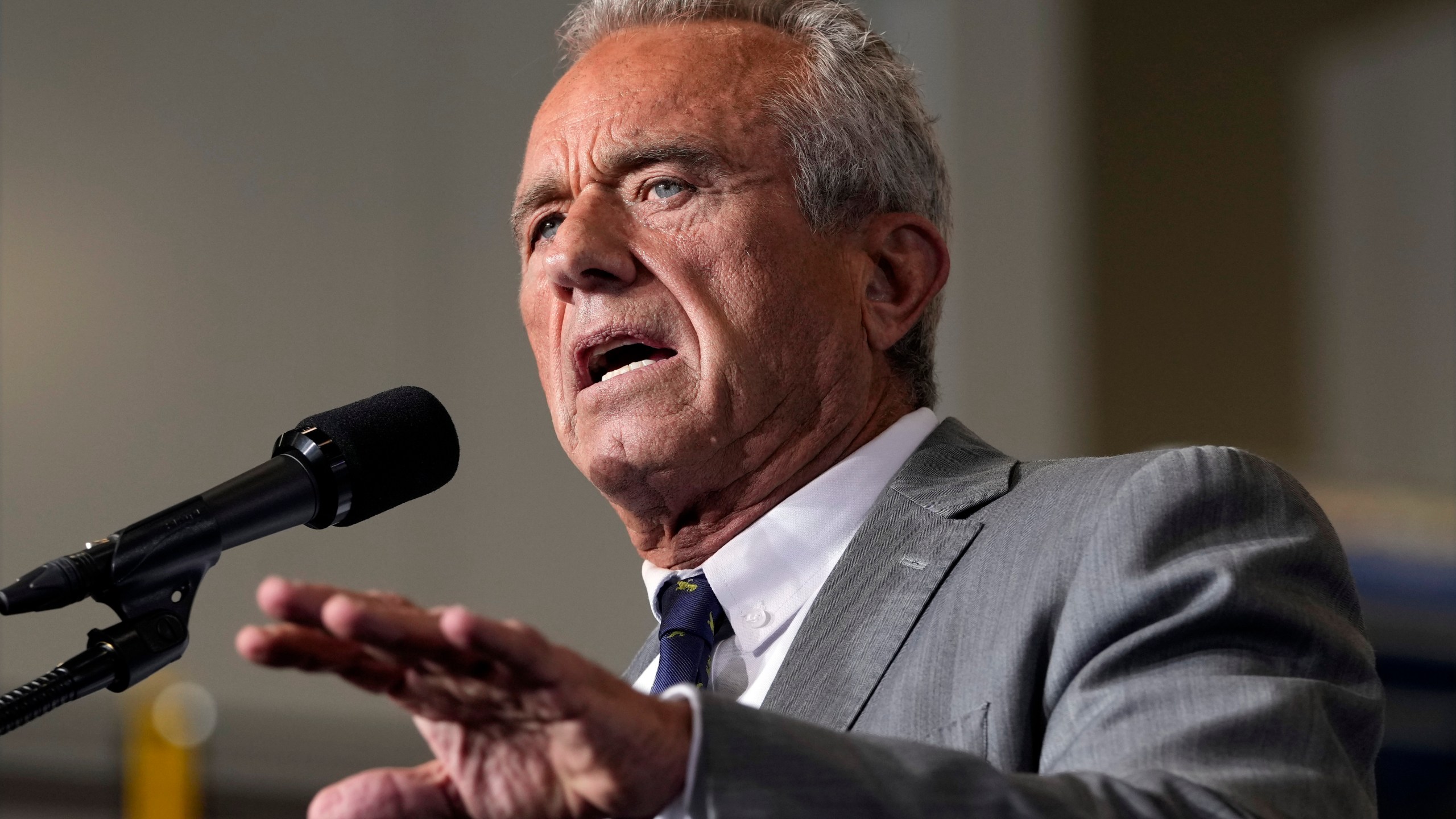 Robert F. Kennedy, Jr., speaks before Republican presidential nominee former President Donald Trump at a campaign event, Friday, Sept. 27, 2024 in Walker, Mich. (AP Photo/Carlos Osorio)