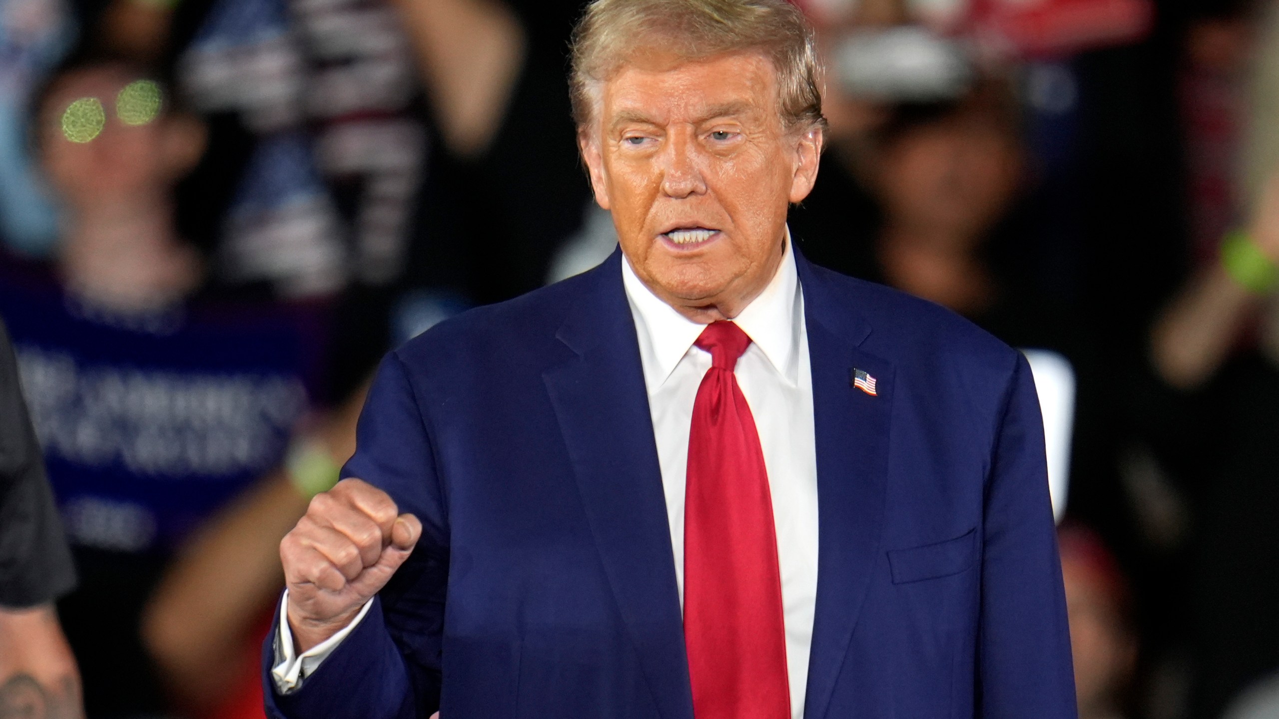 Republican presidential nominee former President Donald Trump arrives for a town hall event at Macomb Community College Friday, Sept. 27, 2024, in Warren, Mich. (AP Photo/Paul Sancya)