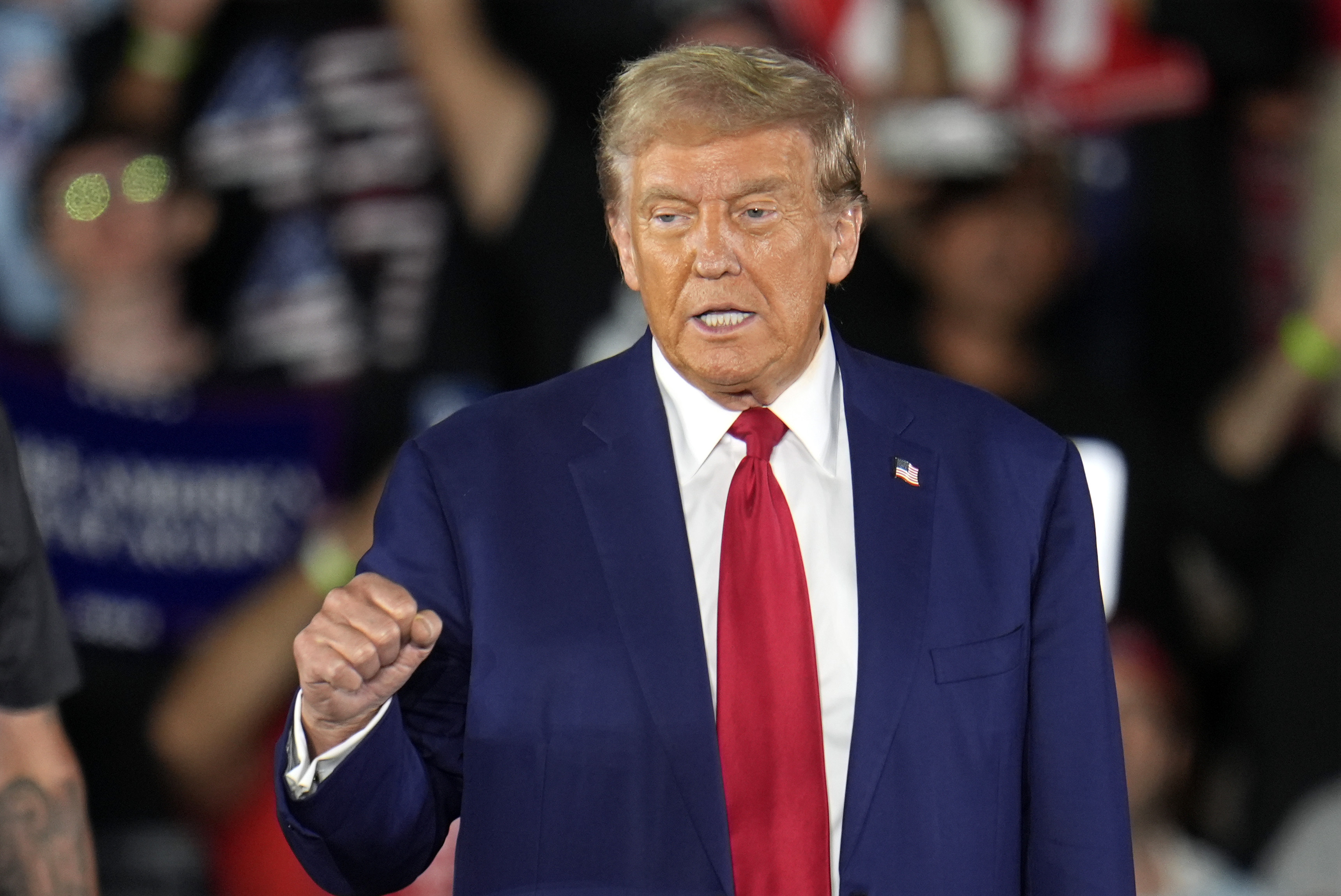 Republican presidential nominee former President Donald Trump arrives for a town hall event at Macomb Community College Friday, Sept. 27, 2024, in Warren, Mich. (AP Photo/Paul Sancya)