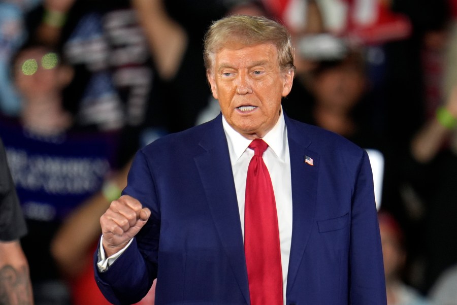 Republican presidential nominee former President Donald Trump arrives for a town hall event at Macomb Community College Friday, Sept. 27, 2024, in Warren, Mich. (AP Photo/Paul Sancya)