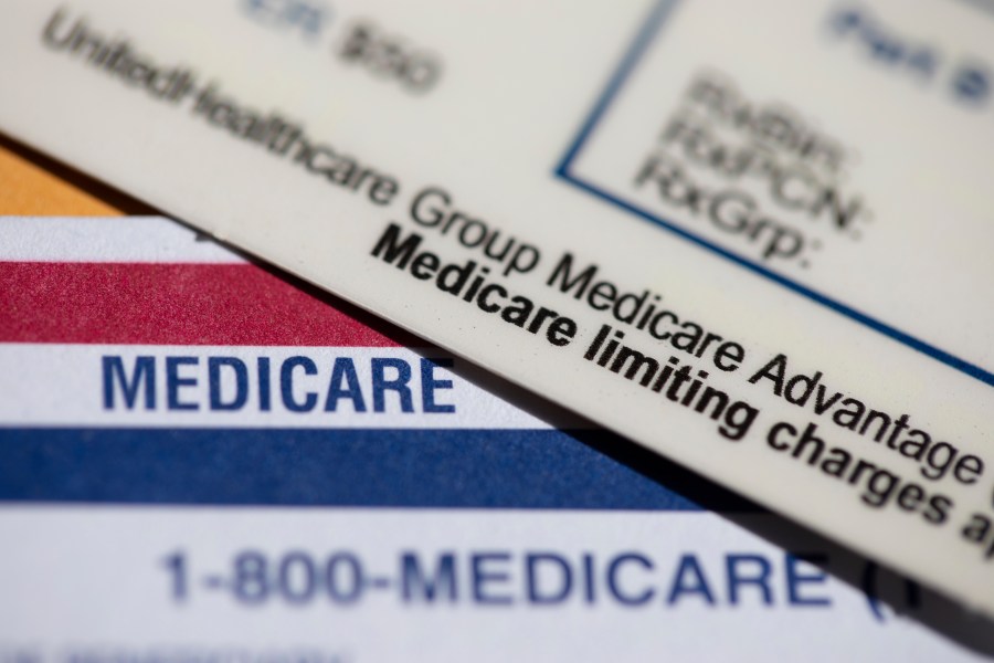 FILE - A UnitedHealthcare Group Medicare Advantage PPO card rests on top of a Medicare card is seen in Portland, Ore., June 10, 2024. (AP Photo/Jenny Kane, File)