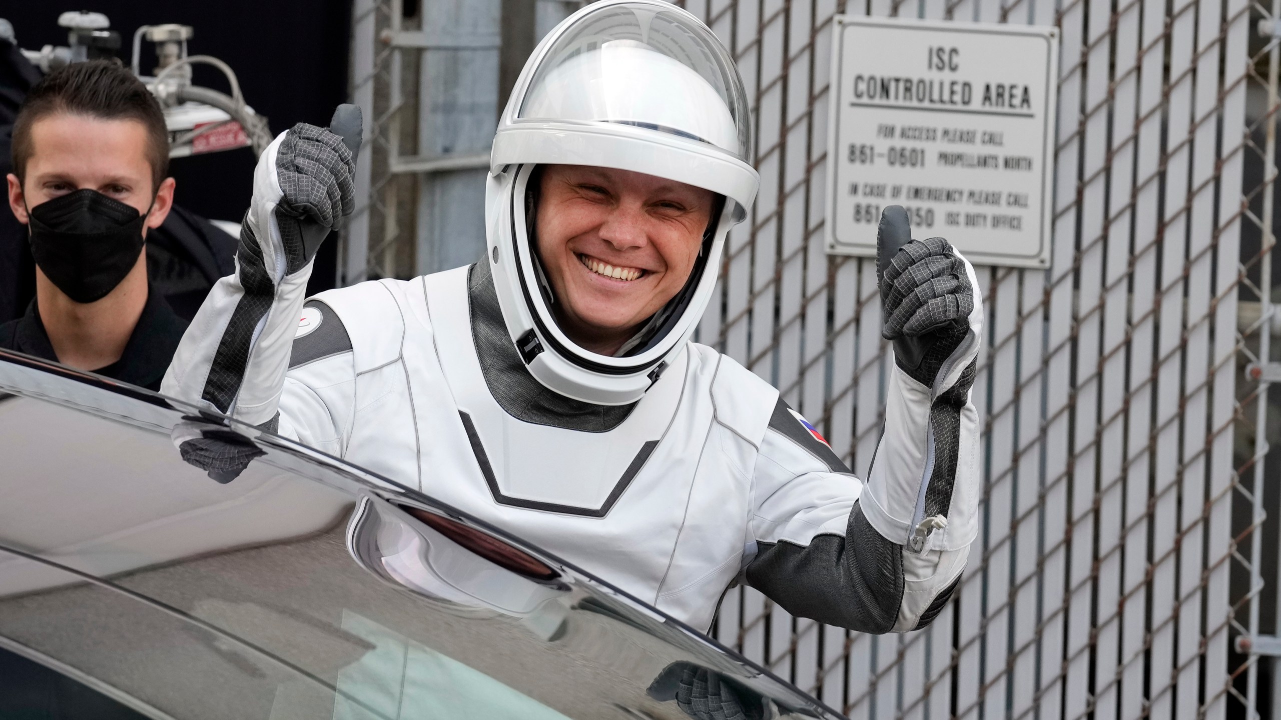 Roscosmos cosmonaut Aleksandr Gorbunov reacts as he leaves the Operations and Checkout building for a trip to the launch pad 40 Saturday, Sept. 28, 2024, at the Kennedy Space Center in Cape Canaveral, Fla. (AP Photo/Chris O'Meara)