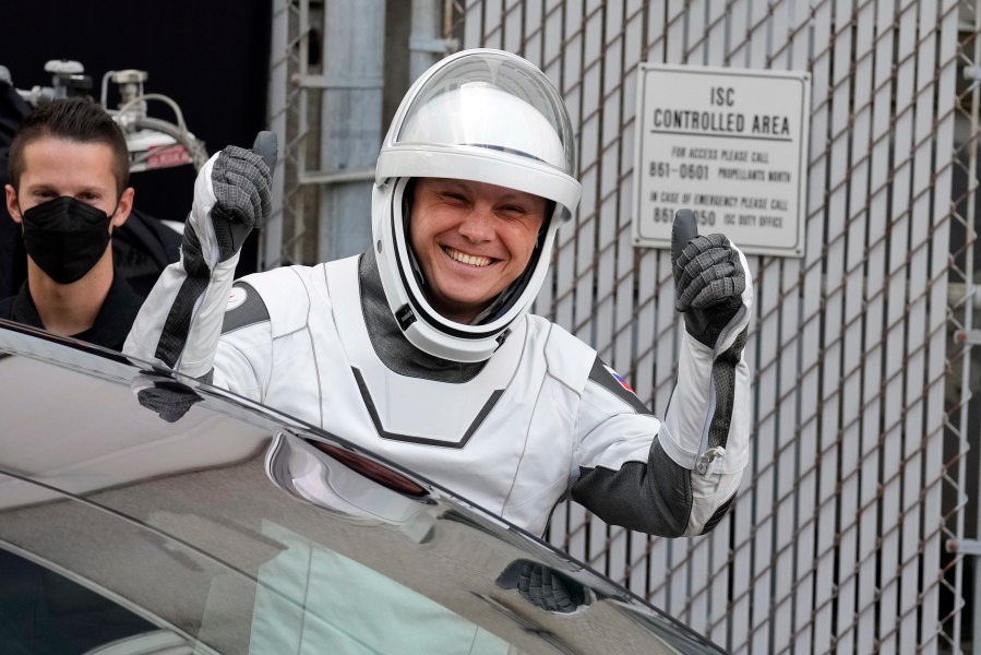 Roscosmos cosmonaut Aleksandr Gorbunov reacts as he leaves the Operations and Checkout building for a trip to the launch pad 40 Saturday, Sept. 28, 2024, at the Kennedy Space Center in Cape Canaveral, Fla. (AP Photo/Chris O'Meara)