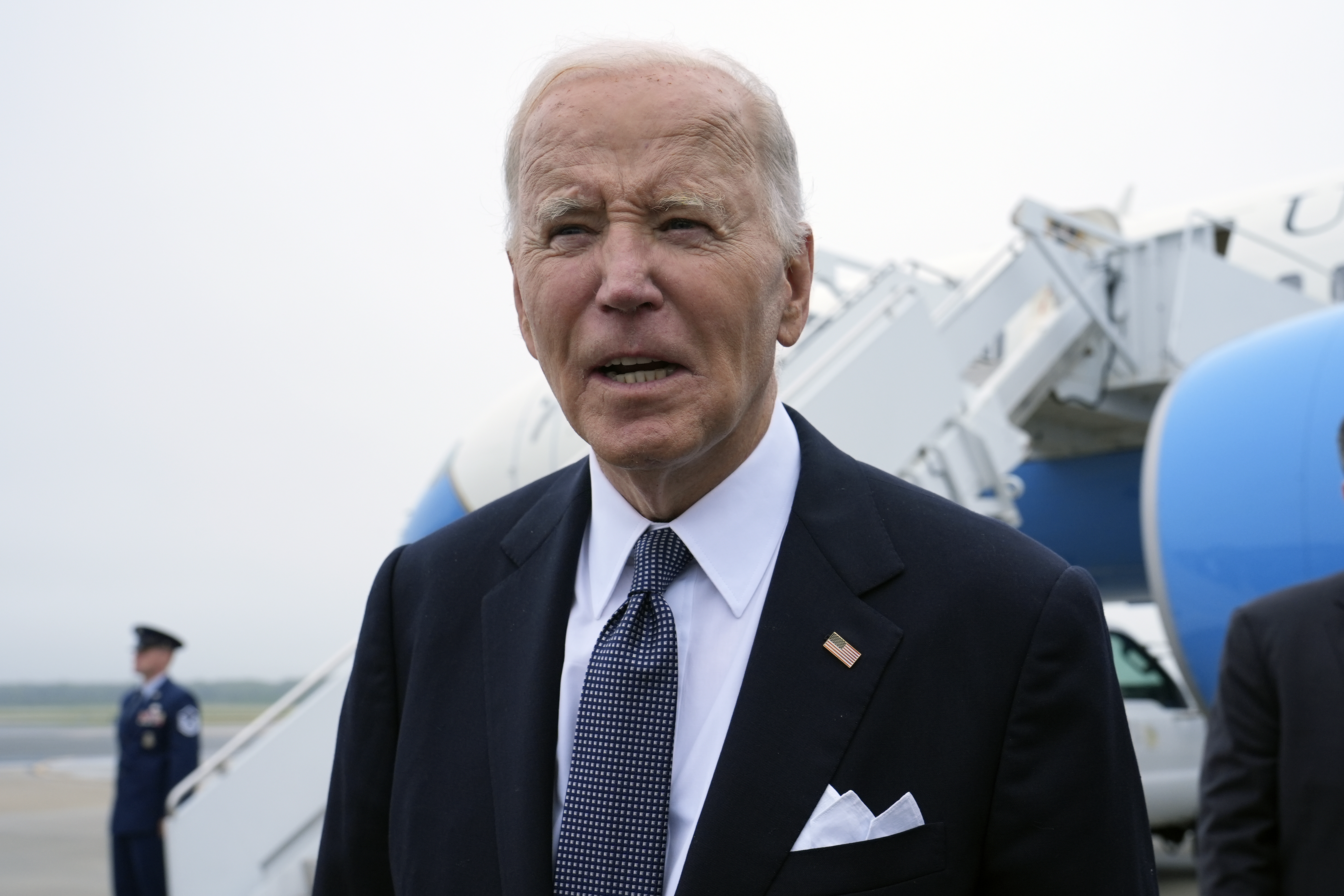 President Joe Biden speaks the the media after stepping off Air Force One at Dover Air Force Base in Delaware, Friday, Sept. 27, 2024, to spend the weekend at his beach home in Rehoboth Beach, Del. (AP Photo/Susan Walsh)