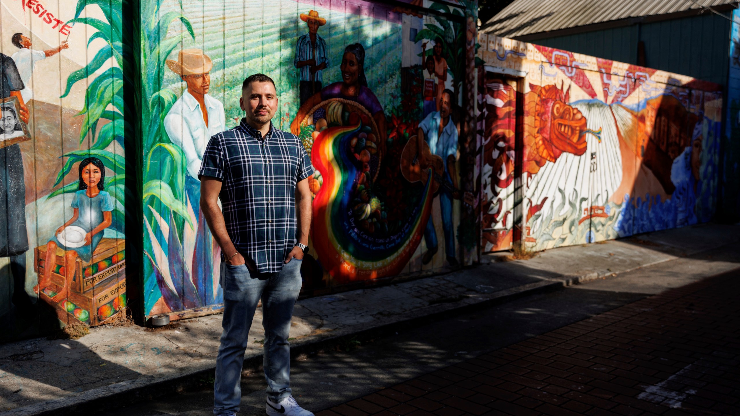 Luis A. Torres stands for a portrait at Balmy Alley in the Latino Cultural District on Friday, Sept. 20, 2024, in San Francisco. (AP Photo/Juliana Yamada)