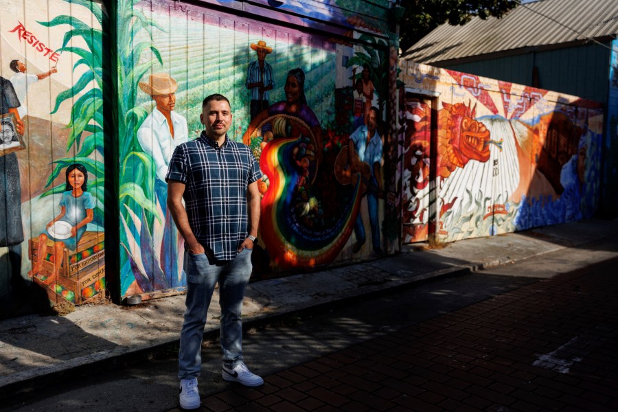 Luis A. Torres stands for a portrait at Balmy Alley in the Latino Cultural District on Friday, Sept. 20, 2024, in San Francisco. (AP Photo/Juliana Yamada)