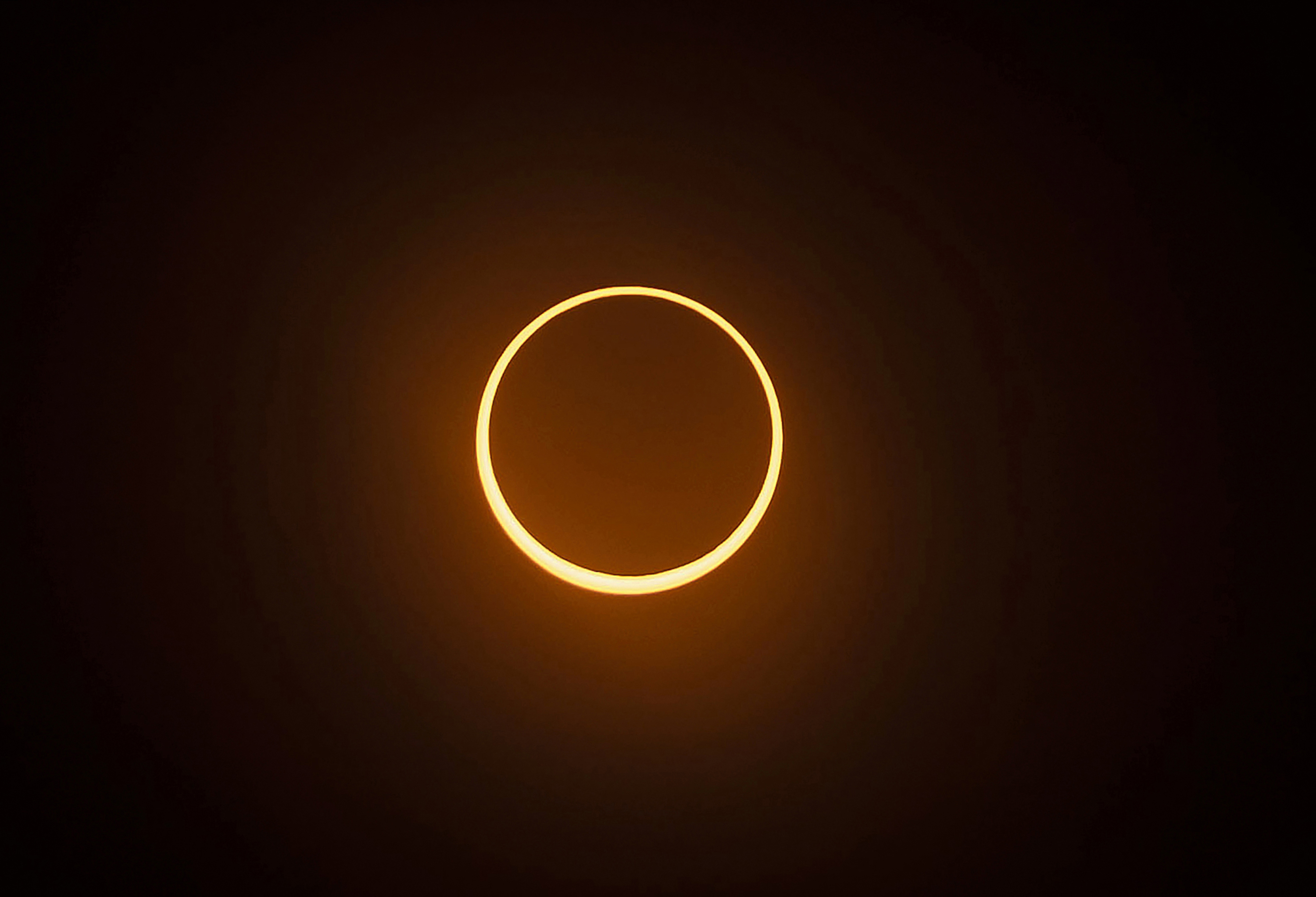 FILE - The "ring of fire" annular eclipse during the Albuquerque International Balloon Fiesta in Albuquerque, N.M., on Saturday, Oct. 14, 2023. (Chancey Bush/The Albuquerque Journal via AP, File)