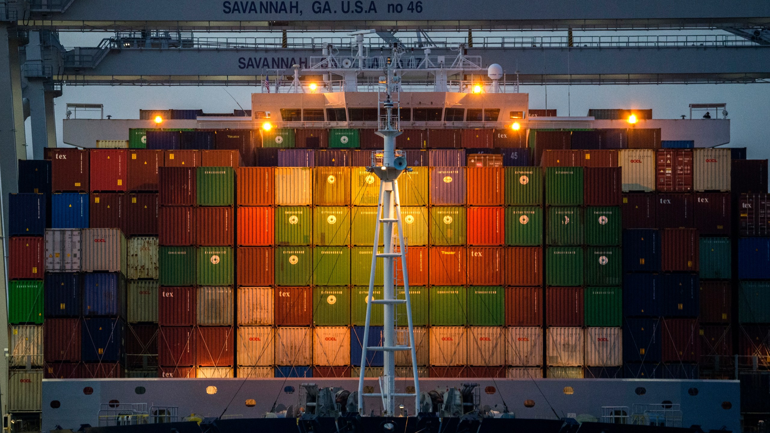 FILE - Ship to shore cranes work the container ship CMA CGM Laperouse at the Georgia Ports Authority's Port of Savannah, Sept. 29, 2021, in Savannah, Ga. (AP Photo/Stephen B. Morton, File)