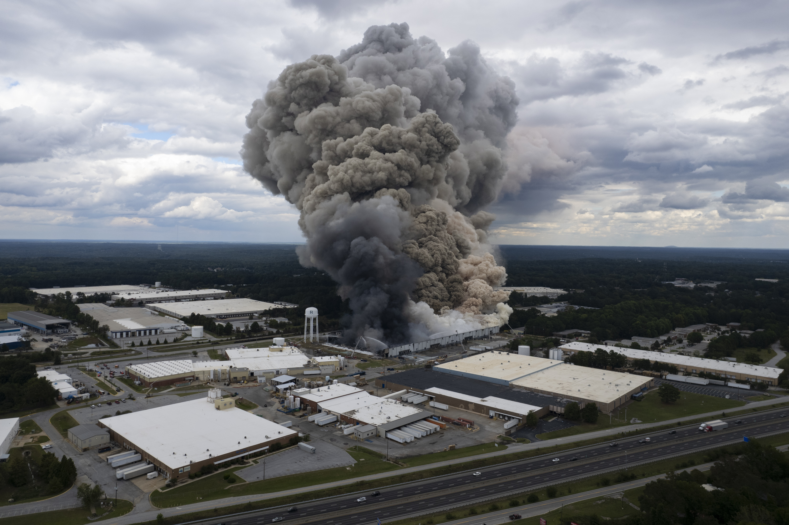 Smoke billows from a fire at the BioLab facility in Conyers, Ga., Sunday, Sept. 29, 2024. (Ben Gray/Atlanta Journal-Constitution via AP)