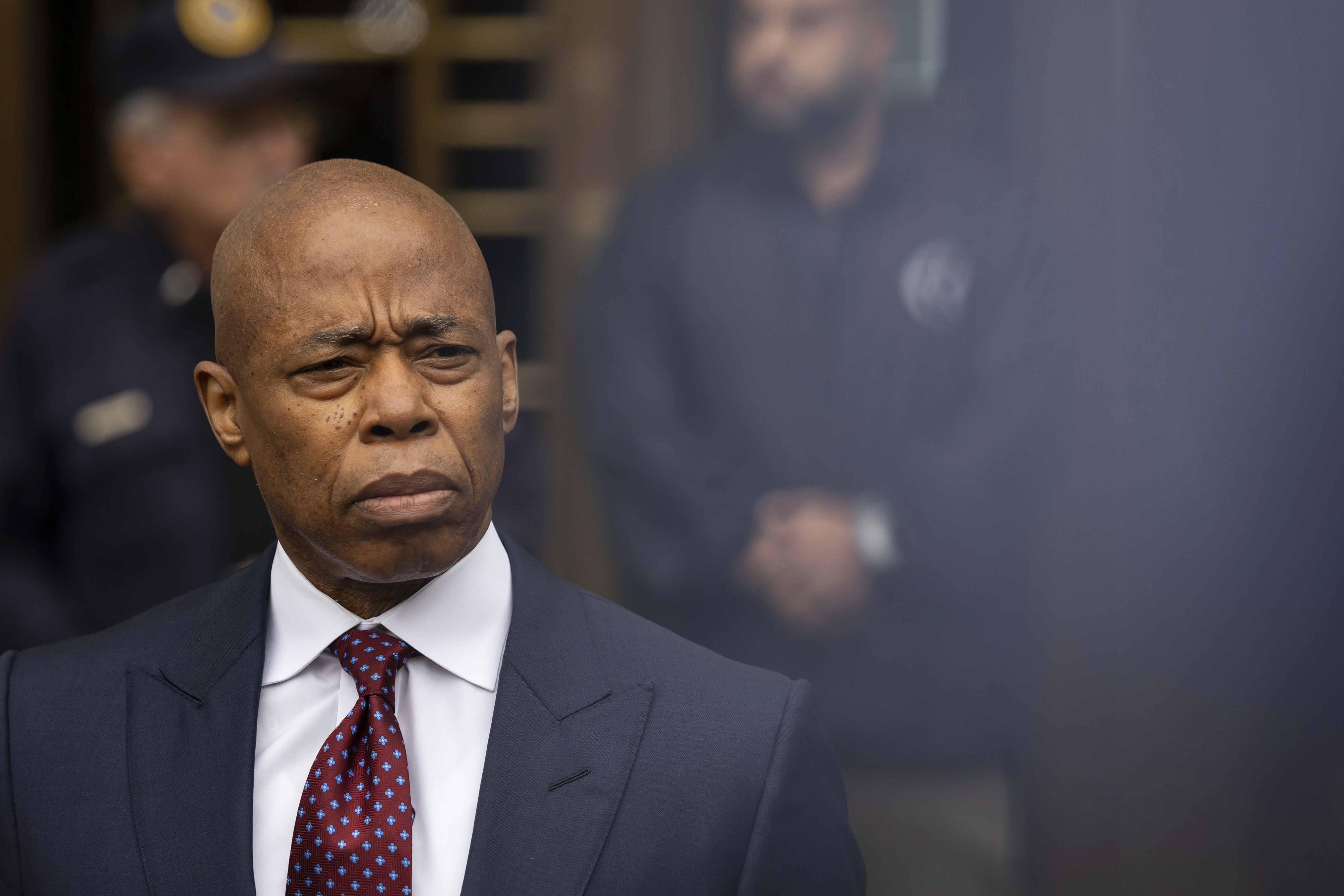 New York City mayor Eric Adams, right, appears outside Manhattan federal court after an appearance, Friday, Sept. 27, 2024, in New York. (AP Photo/Yuki Iwamura)