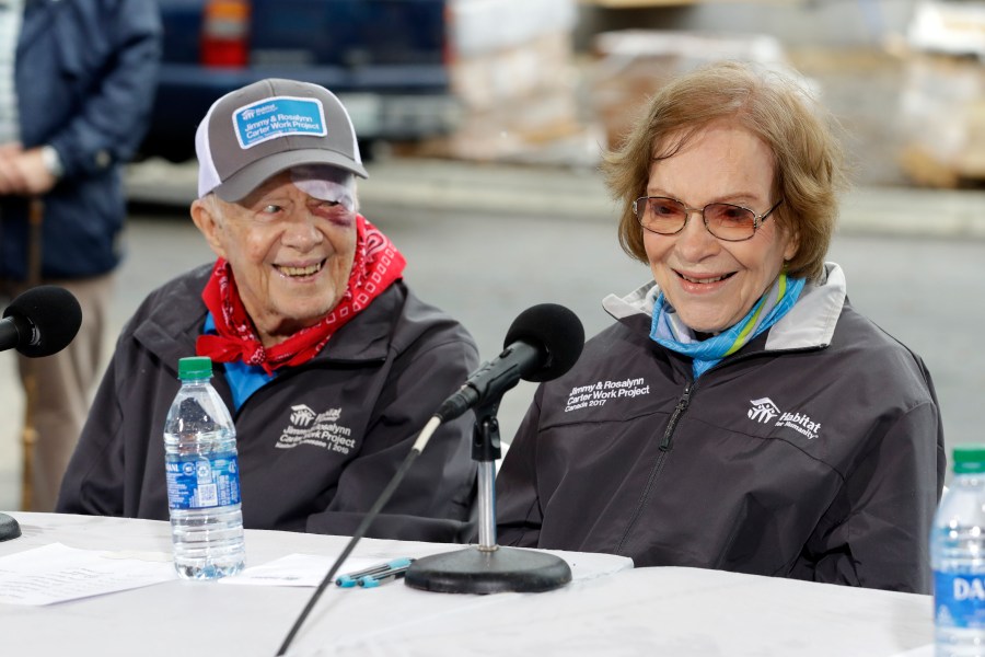 FILE - Former President Jimmy Carter and former First Lady Rosalynn Carter answer questions during a news conference at a Habitat for Humanity project Monday, Oct. 7, 2019, in Nashville, Tenn. (AP Photo/Mark Humphrey, File)