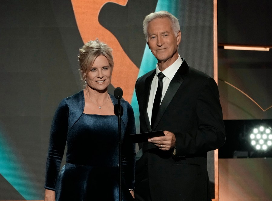 FILE - Mary Beth Evans, left, and Drake Hogestyn present the award for outstanding daytime talk series host during the 50th Daytime Emmy Awards on Friday, Dec. 15, 2023, in Los Angeles. Hogestyn, who played John Black for nearly four decades, has died from pancreatic cancer at age 70. (AP Photo/Chris Pizzello, File)