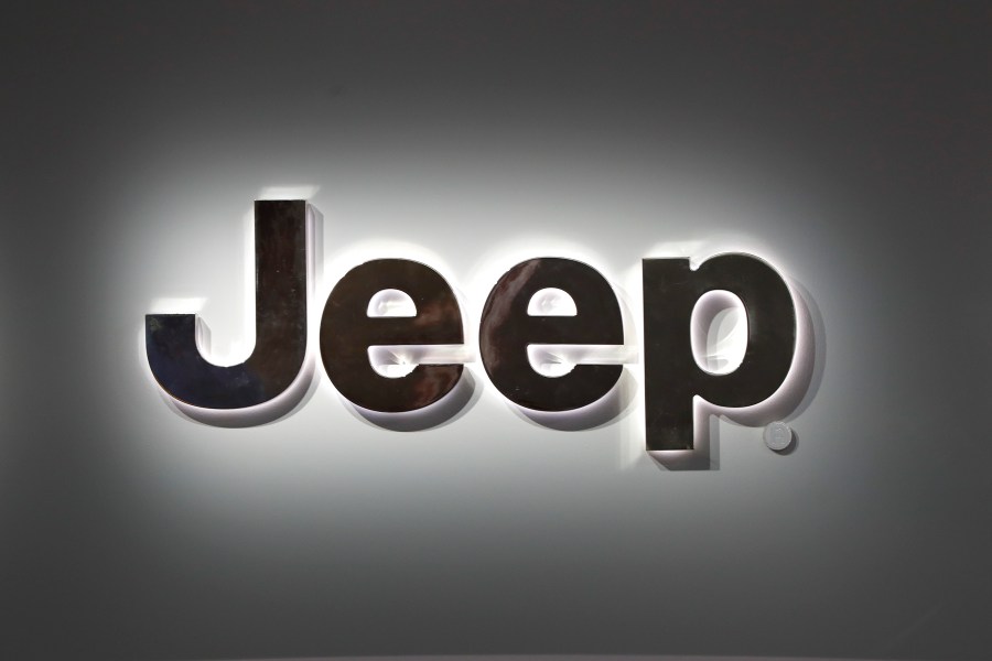 FILE - A Jeep logo is displayed at the North American International Auto Show in Detroit, Jan. 14, 2019. (AP Photo/Paul Sancya, File)