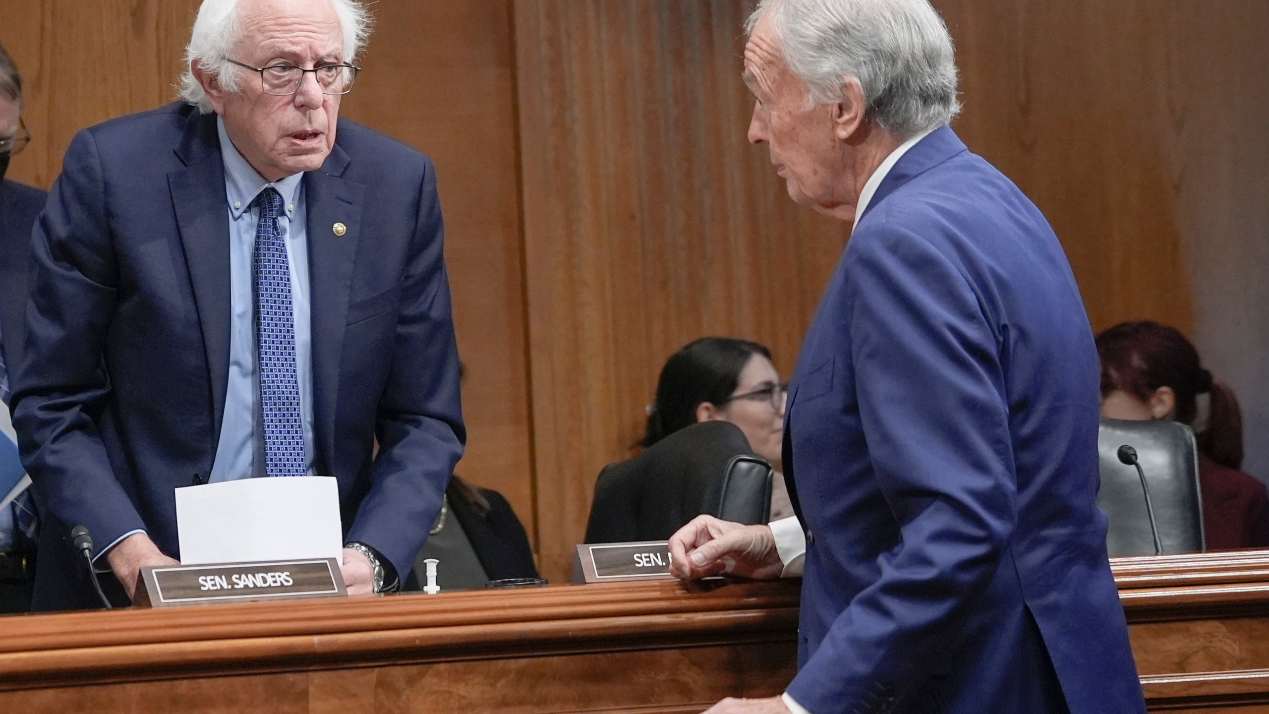 Sen. Bernie Sanders, I-Vt., left, speaks with Sen. Edward Markey, D-Mass., right, after a Senate Health, Education, Labor, and Pensions Committee business meeting on Capitol Hill, Thursday, Sept. 19, 2024, in Washington. (AP Photo/Mariam Zuhaib)