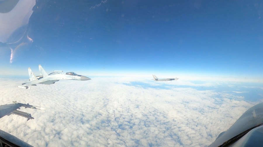 In this Sept. 23, 2024, image taken from video, a U.S. Air Force F-16 operating under the direction of North American Aerospace Defense Command, conducts a routine intercept of a Russian Tu-95 aircraft in the Alaskan Air Defense Identification Zone (ADIZ) when NORAD said a Russian Su-35 aircraft conducts an unsafe maneuver directed at the F-16. (Department of Defense via AP)