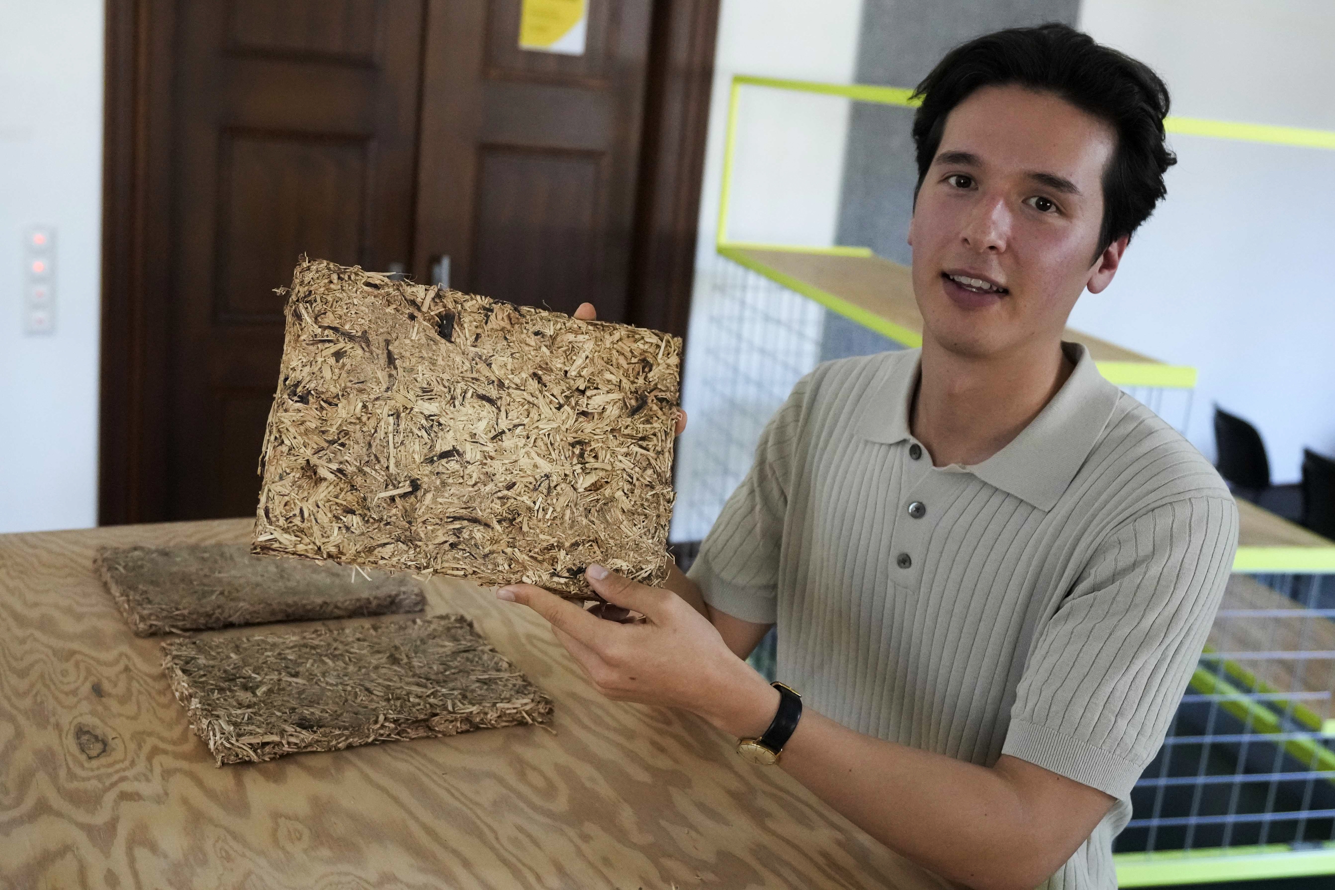 HopfON entrepreneur, Mauricio Fleischer Acuna poses in Munich, Germany, Friday, Sept. 20, 2024. The startup is using the organic waste, some from the hops harvest, to make sustainable building materials like acoustic panels and thermal insulation, with the twofold goal of reducing waste from the construction industry. (AP Photo/Matthias Schrader)