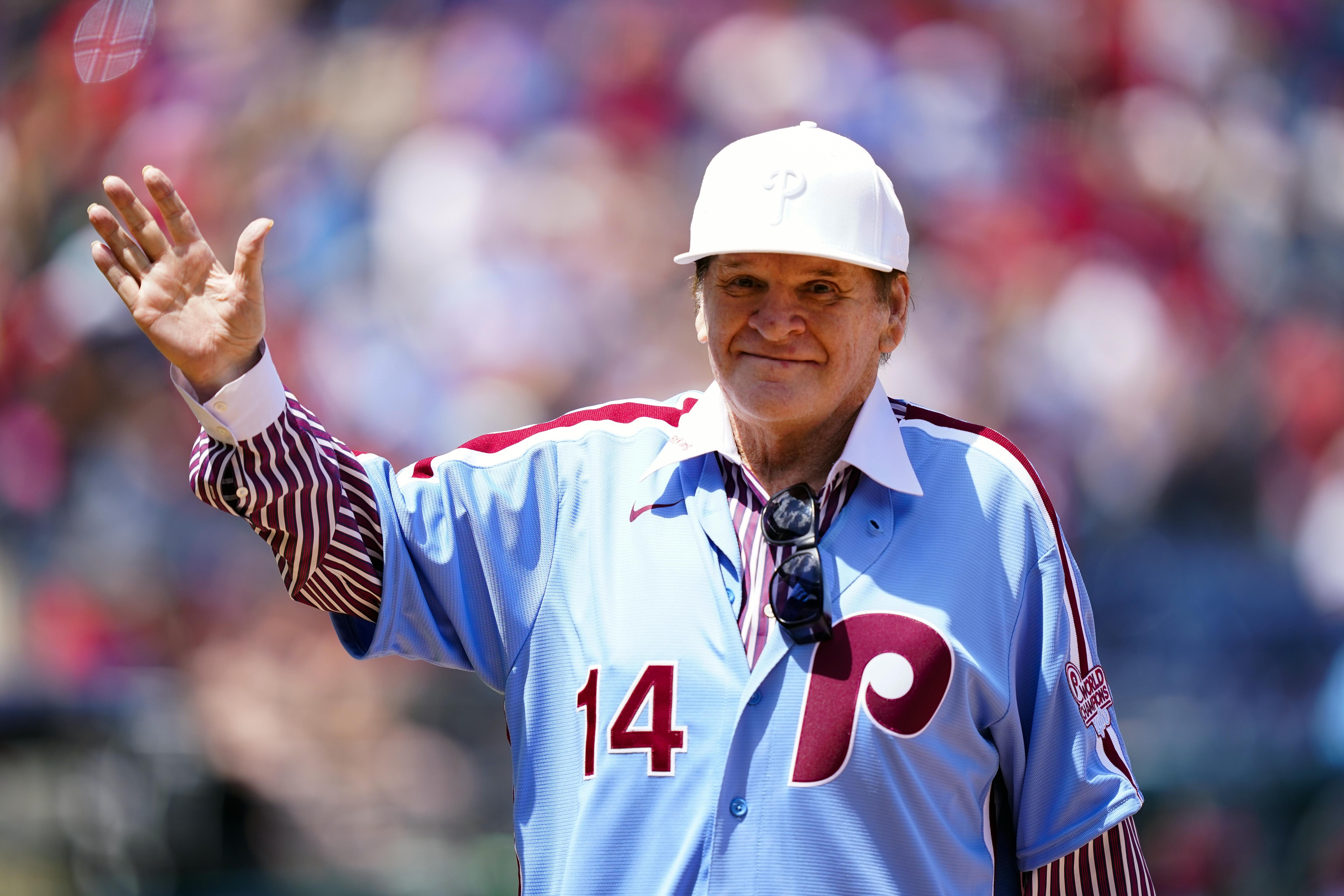 FILE - Former Philadelphia Phillies player Pete Rose tips his hat to fans during an alumni day, Aug. 7, 2022, in Philadelphia. (AP Photo/Matt Rourke, File)