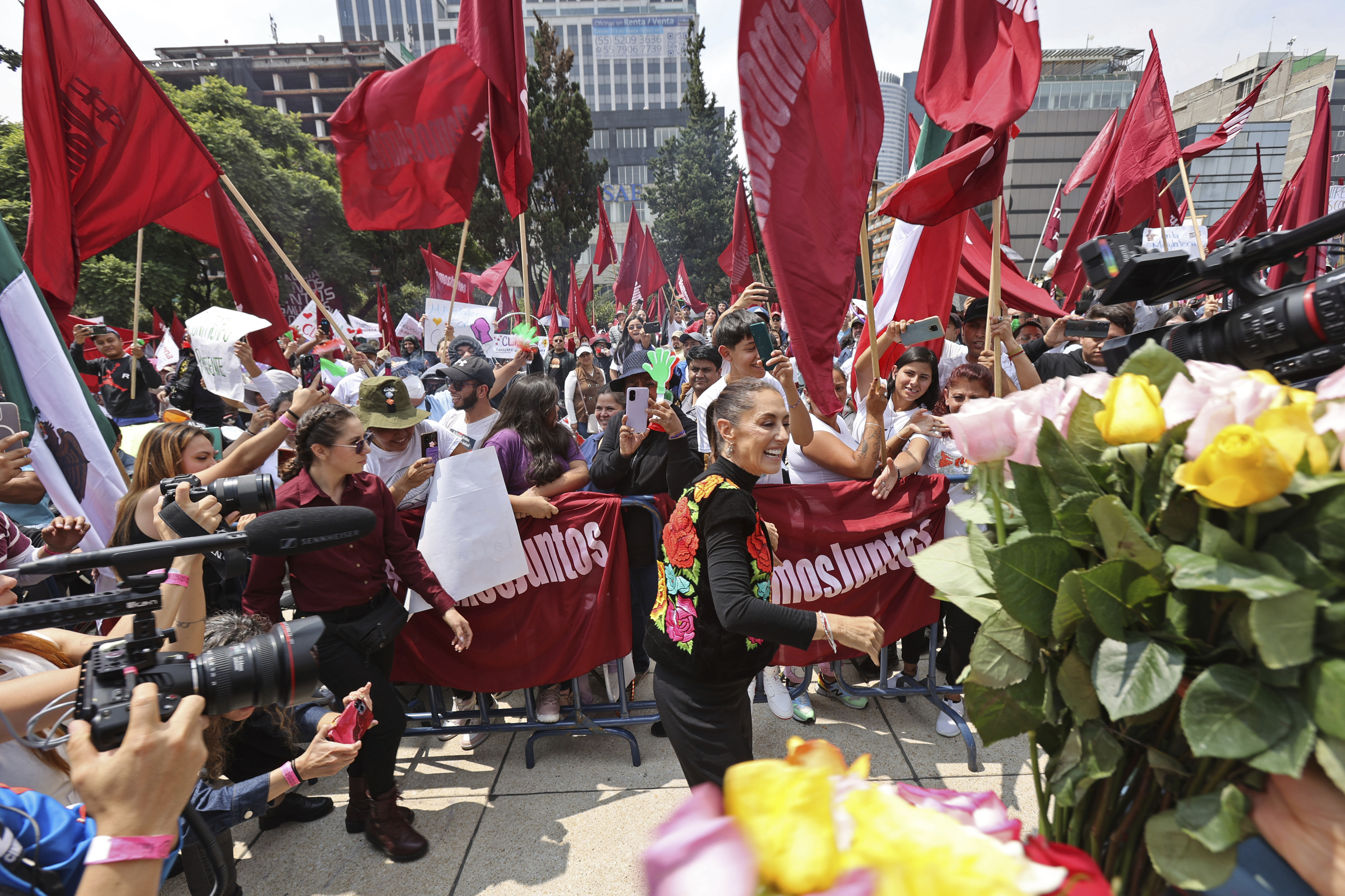 FILE - Former Mayor Claudia Sheinbaum greets supporters during a closing campaign rally for her presidential candidate bid to represent the ruling MORENA party, in Mexico City, Aug. 26, 2023. (AP Photo/Ginnette Riquelme, File)