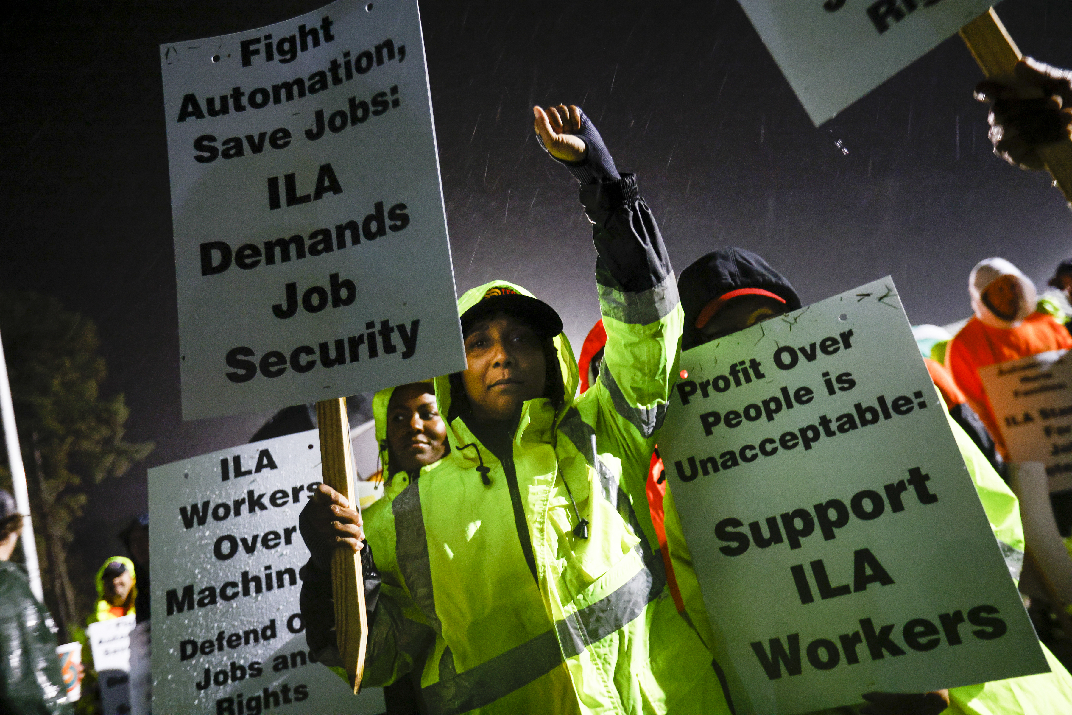 Dockworker Meikysha Wright and others strike outside the Virginia International Gateway in Portsmouth, Va., Tuesday, Oct. 1, 2024. (Billy Schuerman/The Virginian-Pilot via AP)