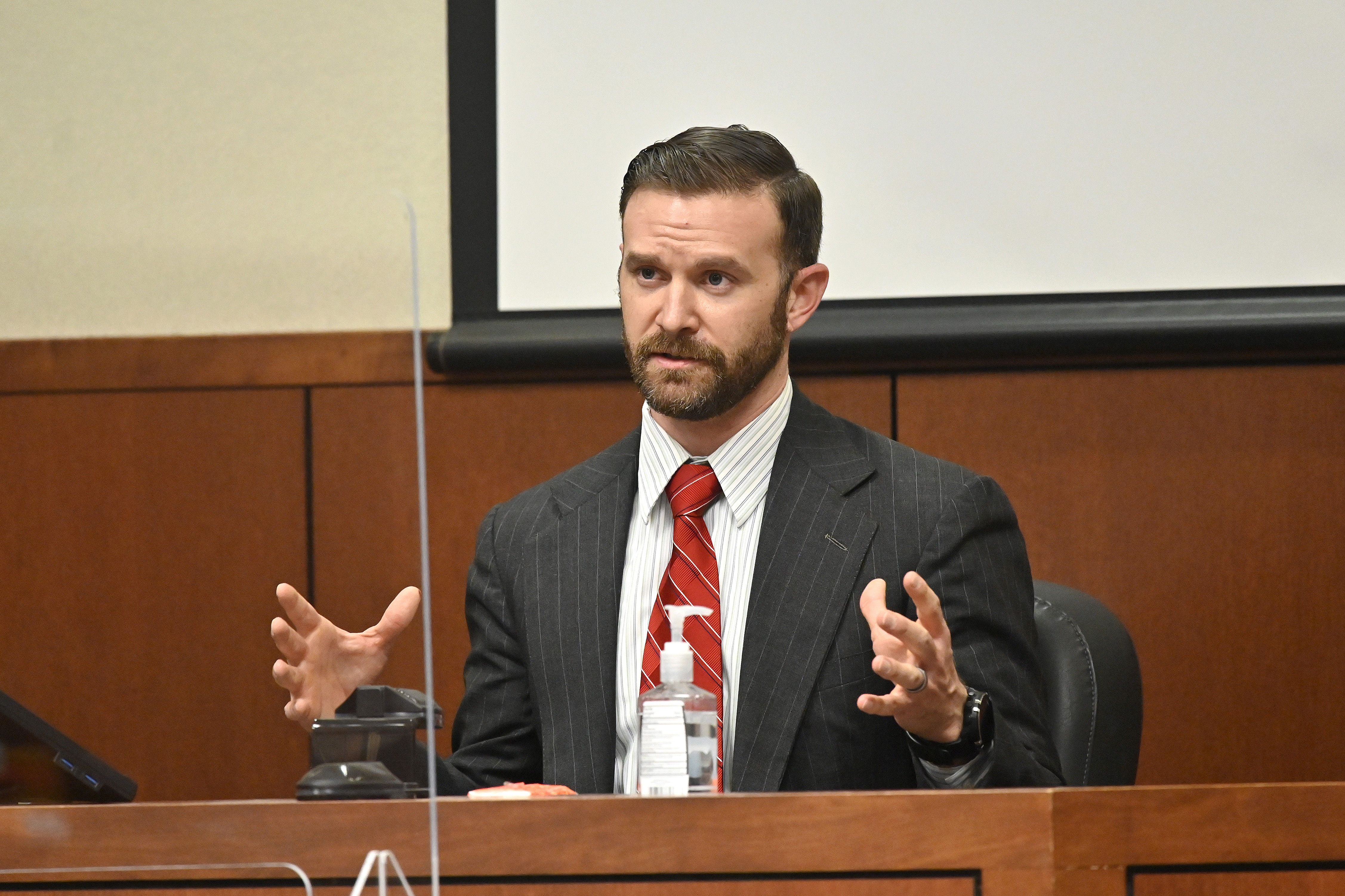 FILE - Sgt. Kyle Meany of the Louisville Metro Police Department testifies, Feb. 23, 2022, in Louisville, Ky. (AP Photo/Timothy D. Easley, Pool, File)