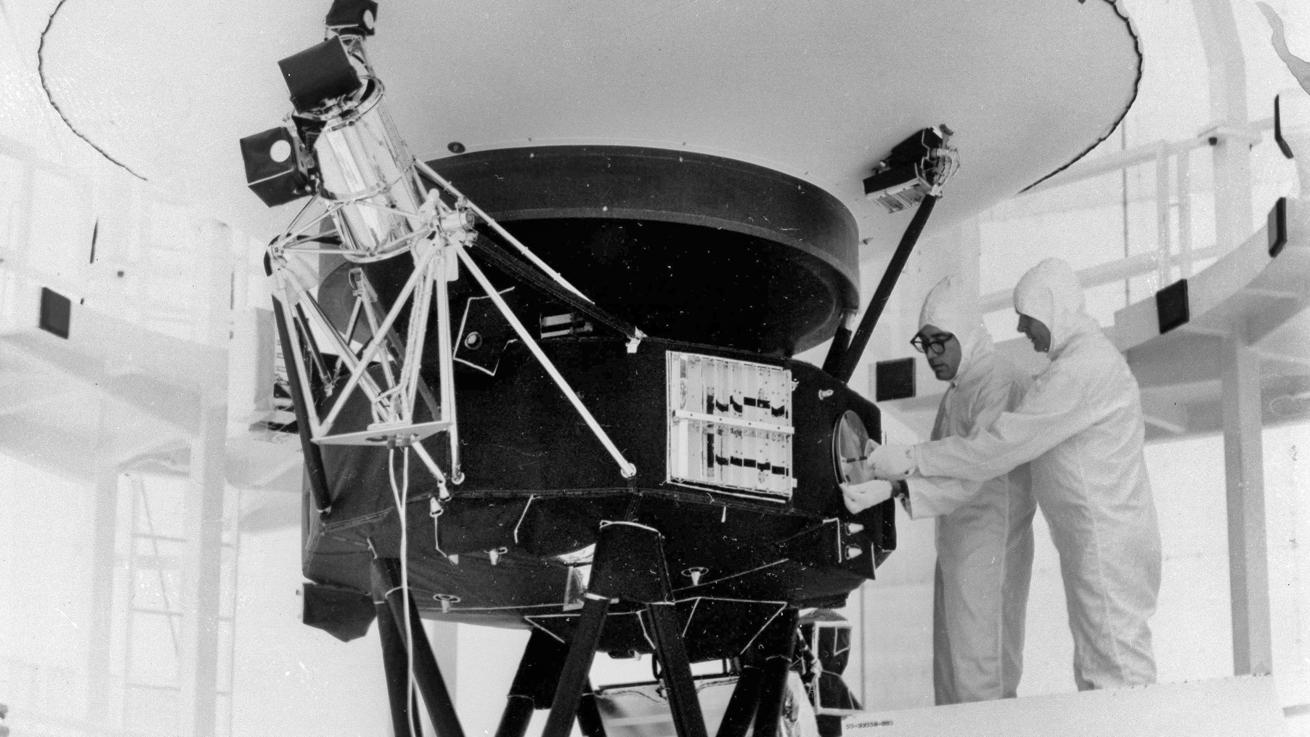 FILE - This photo provided by NASA shows the "Sounds of Earth" record being mounted on the Voyager 2 spacecraft in the Safe-1 Building at the Kennedy Space Center, Fla. Aug. 4, 1977. (AP Photo/NASA, File)