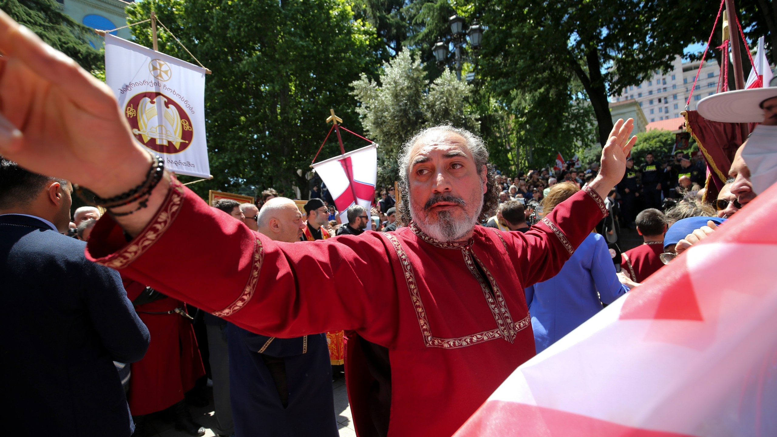 FILE - A Georgian Orthodox Church clergyman attends a celebration of the Day of Family Purity in the conservative country where animosity toward LGBTQ+ people is strong, in Tbilisi, Georgia, on May 17, 2024. (AP Photo/Zurab Tsertsvadze, File)