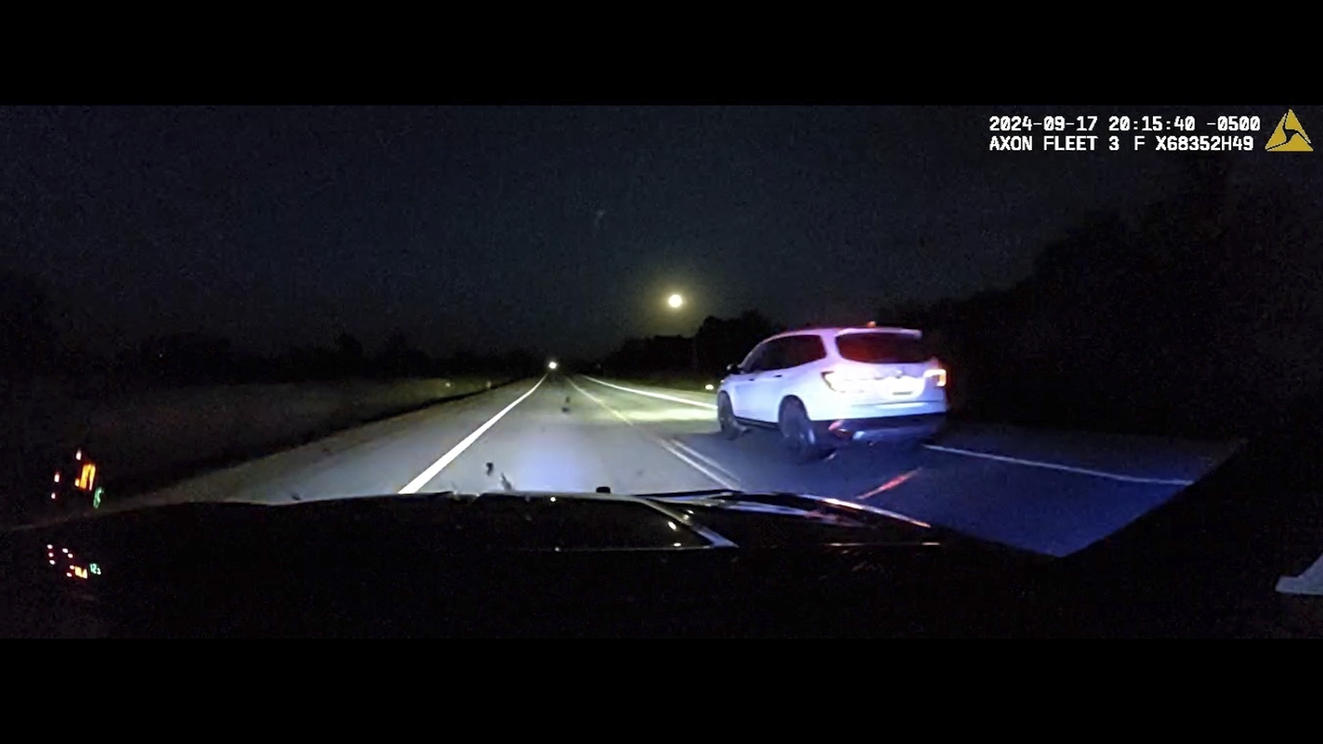 This image taken from police dash camera footage provided by the Minnesota State Patrol, shows a Minnesota trooper passing 18-year-old Sam Dutcher after the Honda Pilot he was driving began to accelerate over 100 miles per hour in western Minnesota on Tuesday, Sept. 17, 2024. The brakes and would not work and the vehicle would not shift into neutral. A trooper managed to speed in front of the Honda and told Sam by phone to crash into the rear of his squad car, allowing it to ease safely to a stop. (Minnesota State Patrol via AP)