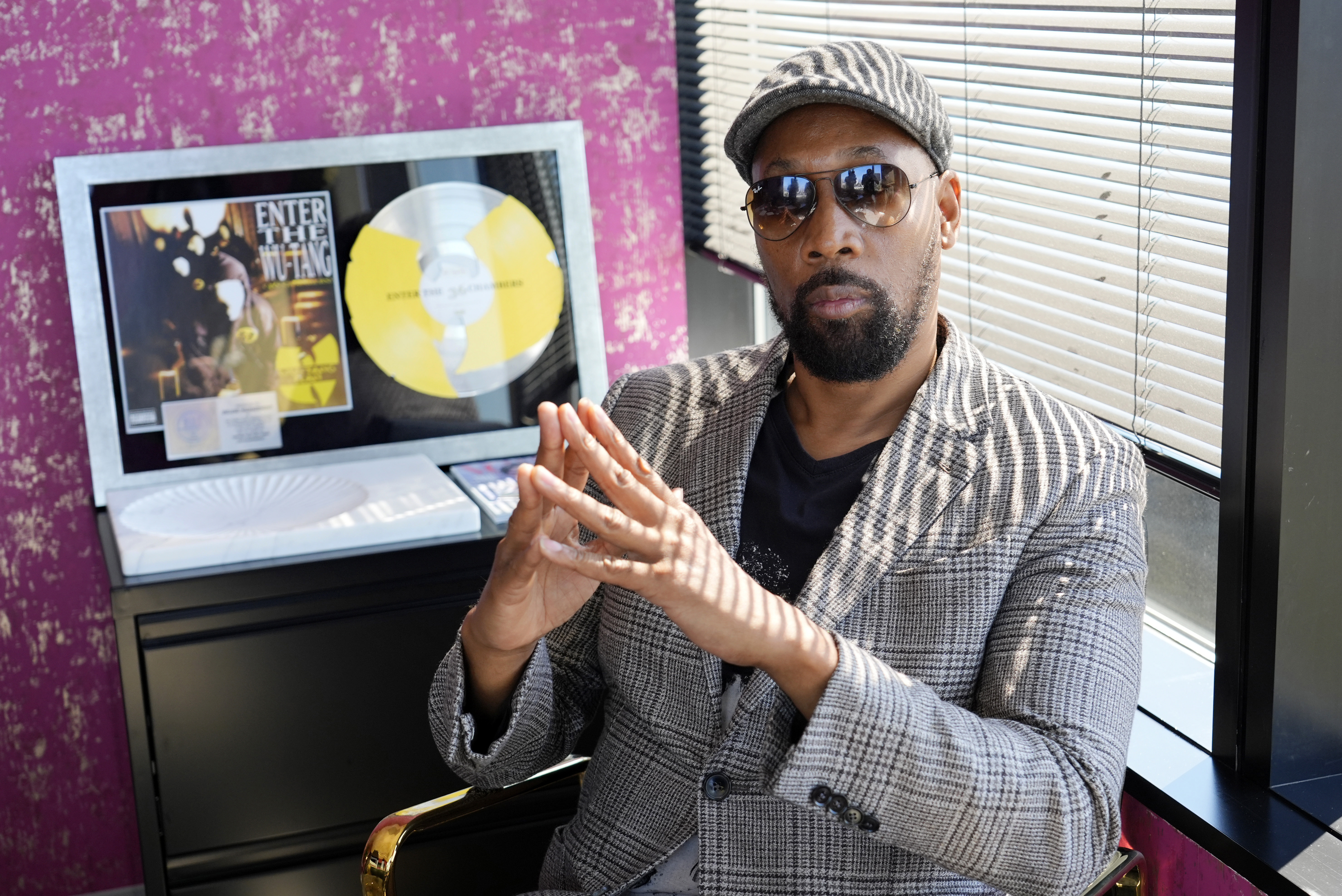 Musician, actor and filmmaker RZA poses for a portrait at his office, Wednesday, Aug. 28, 2024, in Los Angeles. (AP Photo/Chris Pizzello)