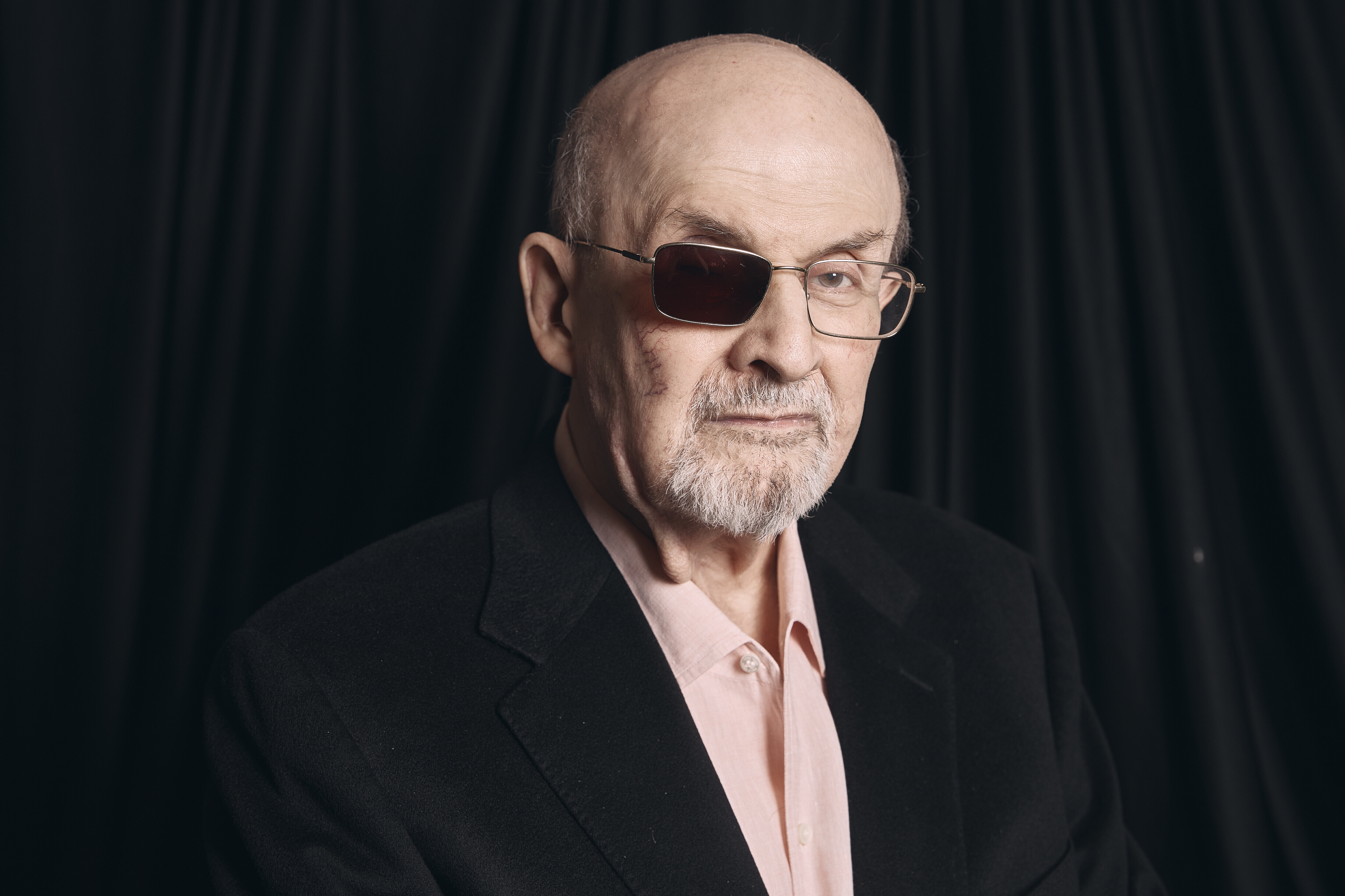 FILE - Salman Rushdie poses for a portrait to promote his book "Knife: Meditations After an Attempted Murder" on April 18, 2024, in New York. (AP Photo/Andres Kudacki, File)