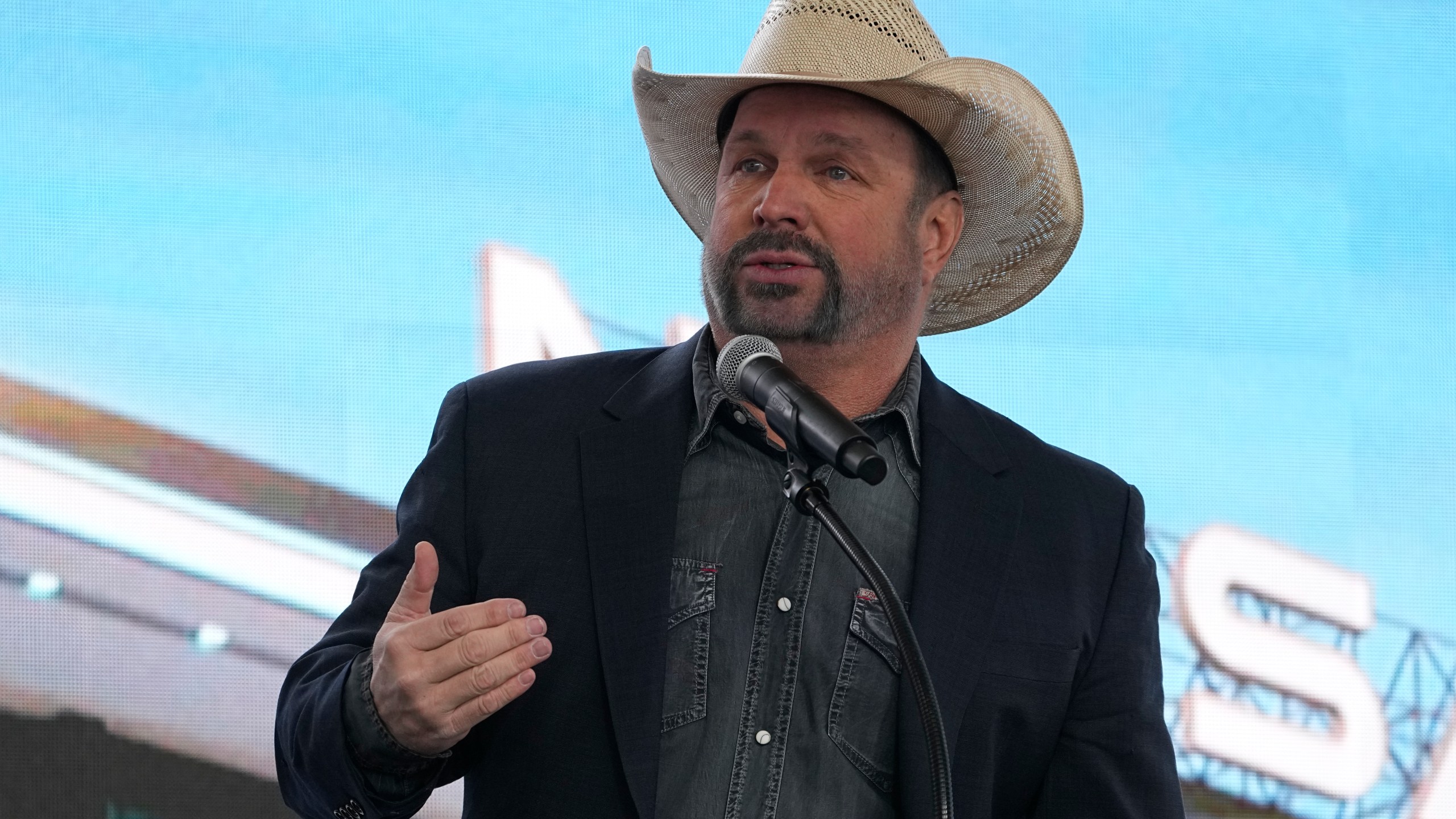 FILE - Garth Brooks speaks during a groundbreaking ceremony for the Tennessee Titans new NFL football stadium, Feb. 29, 2024, in Nashville, Tenn. (AP Photo/George Walker IV, File)