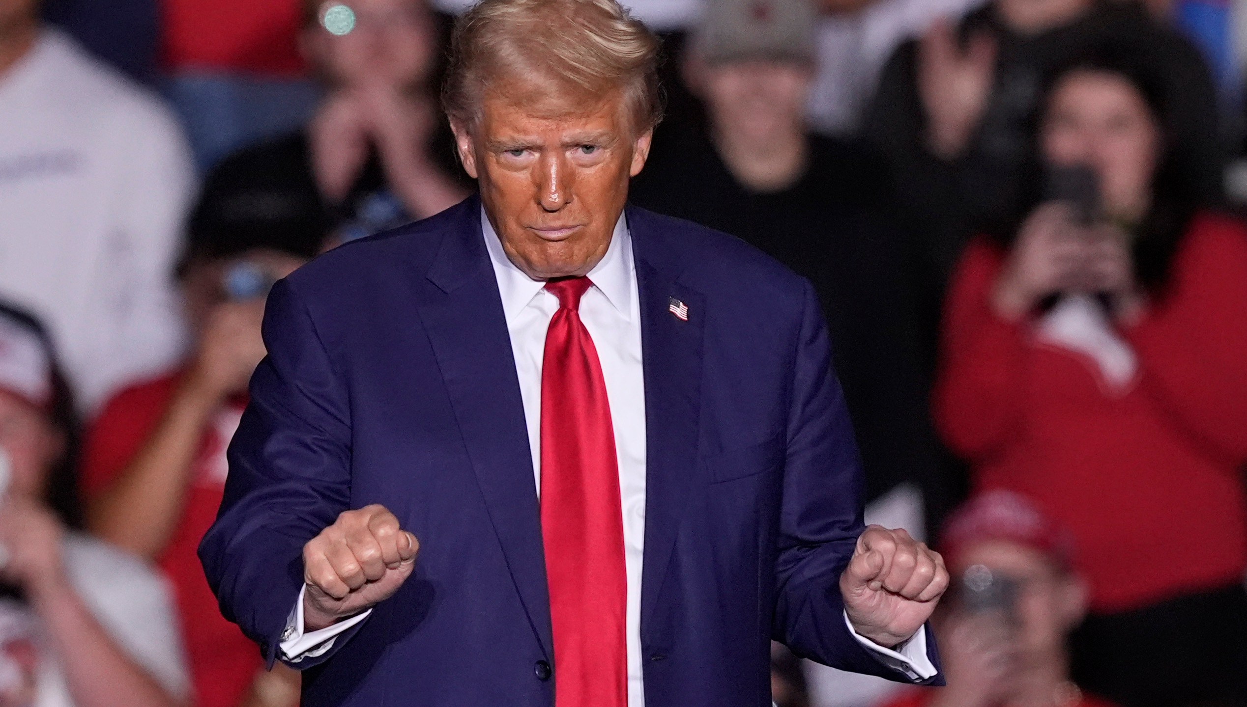 Republican presidential nominee former President Donald Trump dances at a campaign event at the Ryder Center at Saginaw Valley State University, Thursday, Oct. 3, 2024, in University Center, Mich. (AP Photo/Carlos Osorio)